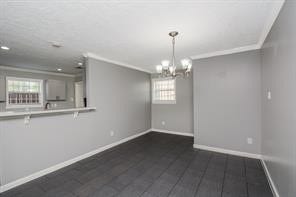 Open concept Dining area has its own storage closet