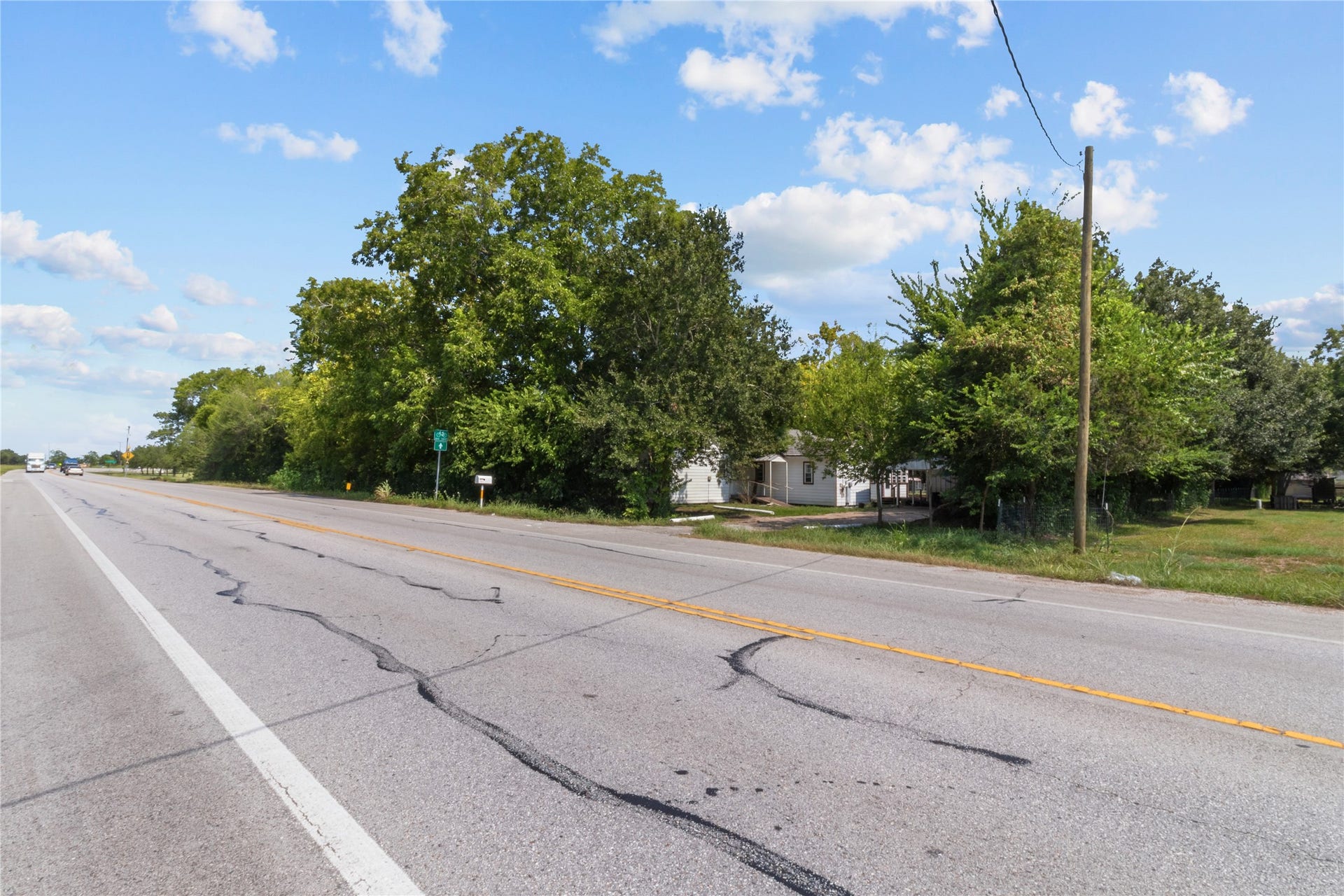 2305 Fm 1462 Road, Alvin, TX 77511 Excellent frontage to FM 1462 with two driveways.