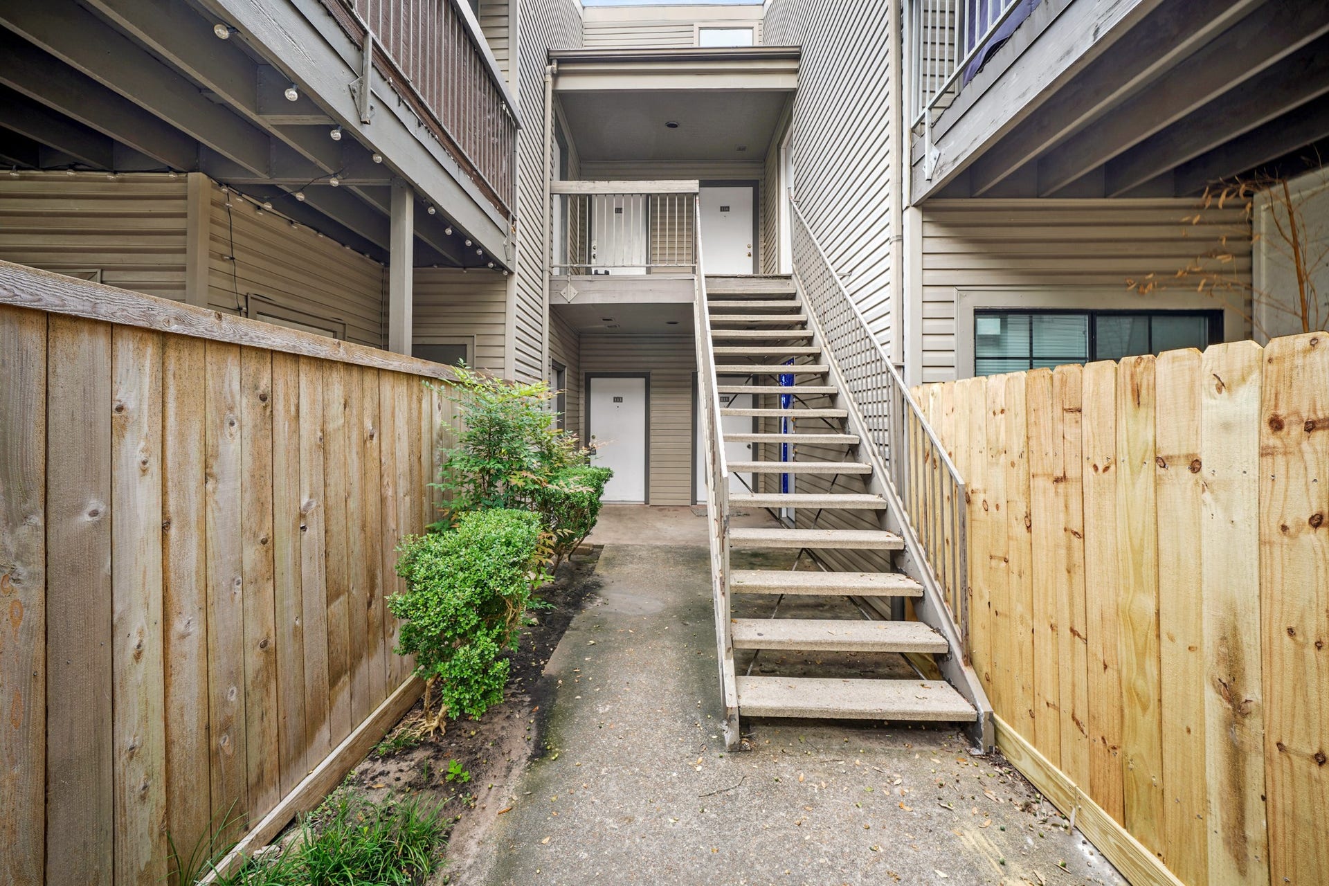 Condo building entrance, this condo is located on the ground level.