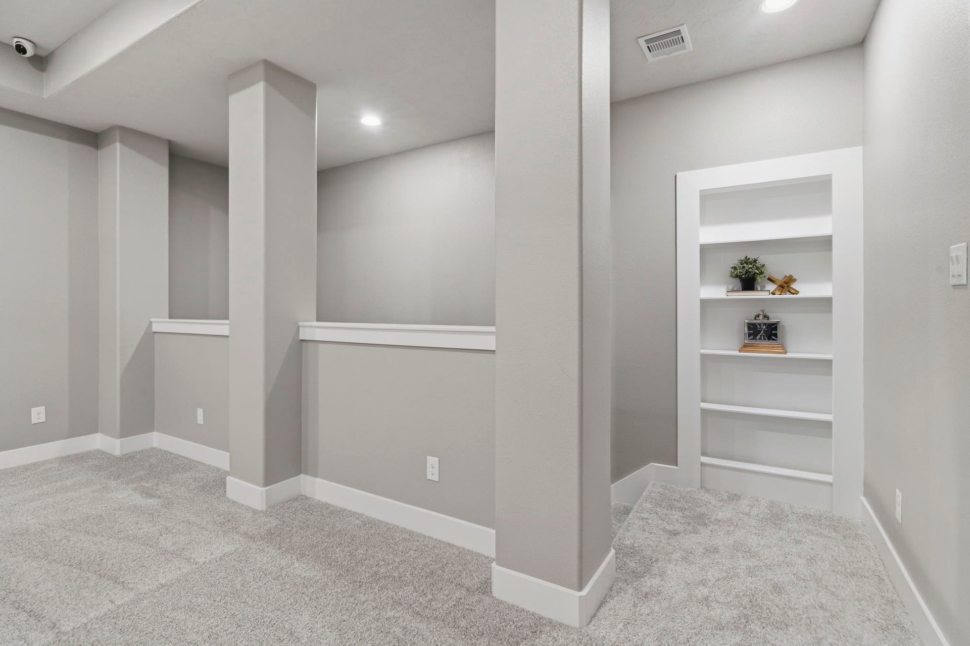 29826 Deer Crest Lane, Fulshear, TX 77406 A tucked-away space behind the built-in shelving provides a private spot ideal for study time, crafts or additional storage.