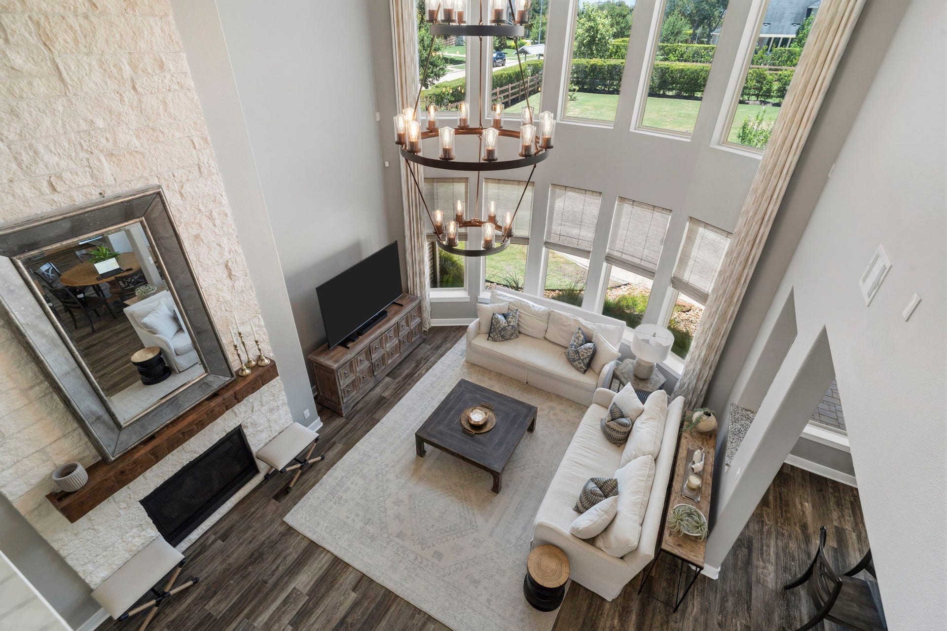 29826 Deer Crest Lane, Fulshear, TX 77406 The open-to-below design creates a striking connection between the first & second floors while showcasing the home's impressive architectural scale.
