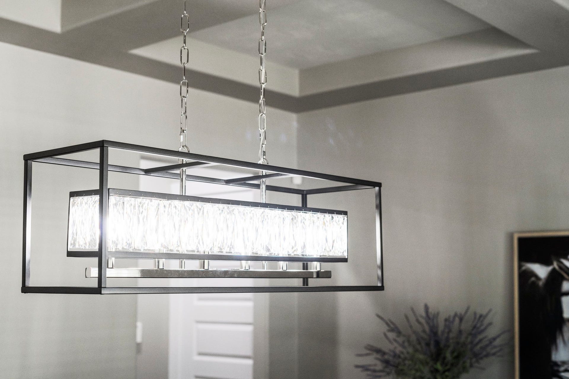 29826 Deer Crest Lane, Fulshear, TX 77406 A closer look at the updated dining room light fixture showcases its sleek geometric design & crystal detailinga polished finishing touch to the space.
