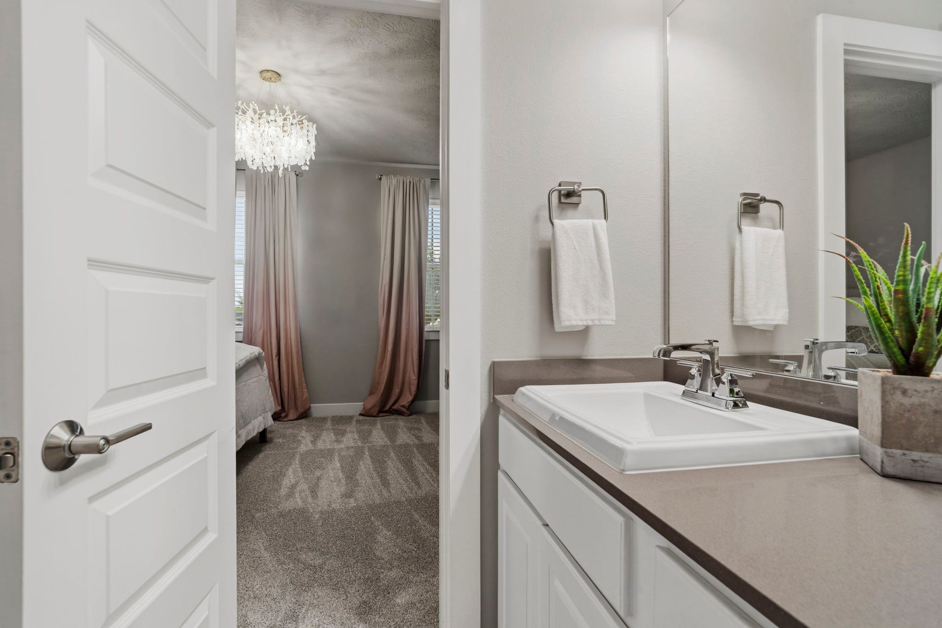 29826 Deer Crest Lane, Fulshear, TX 77406 Private en-suite bath offers convenient direct access from the secondary bedroom & clean, neutral finishes.