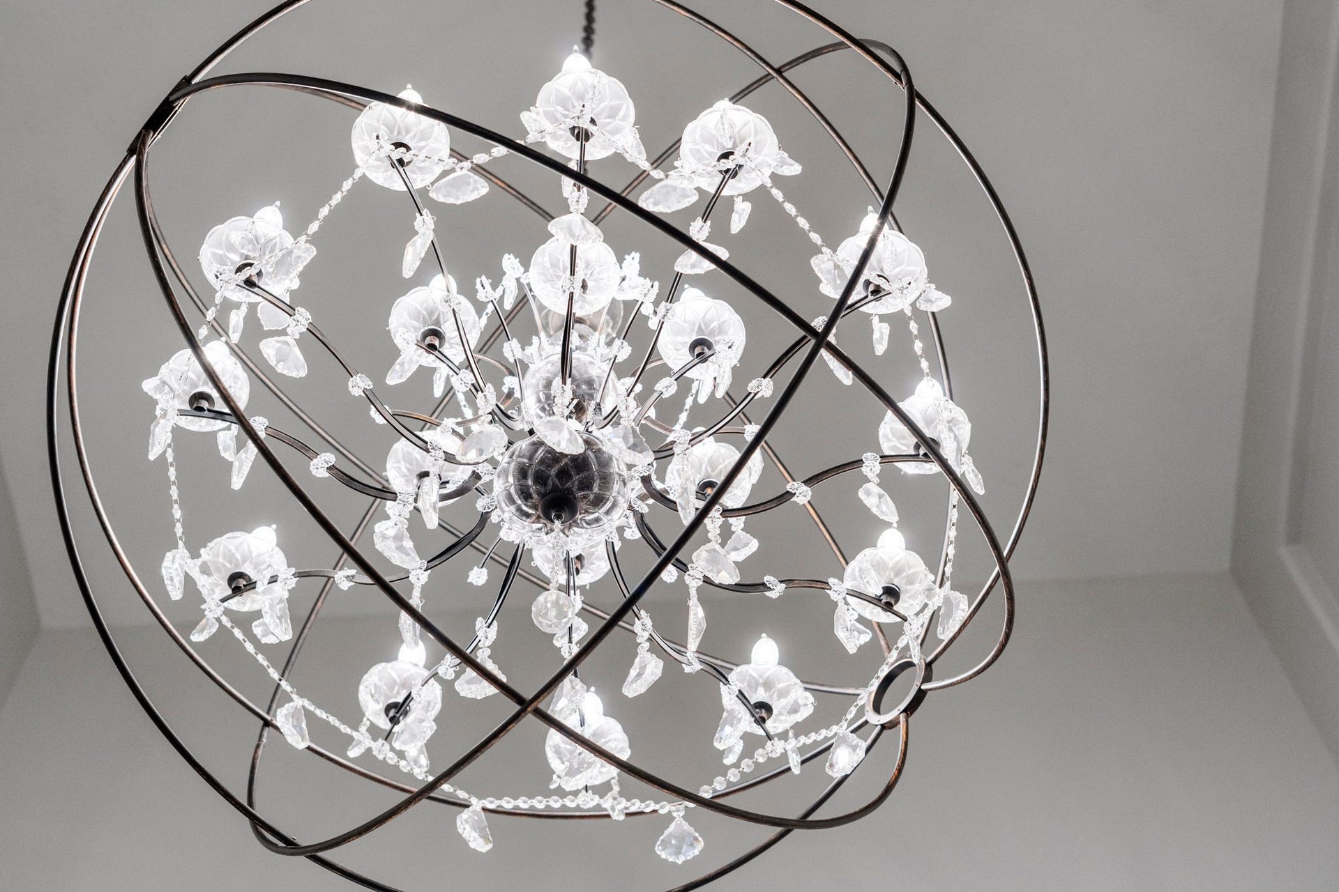 29826 Deer Crest Lane, Fulshear, TX 77406 A statement chandelier brings a sophisticated mix of modern design & timeless crystal detailing, creating a memorable focal point in the grand entry.