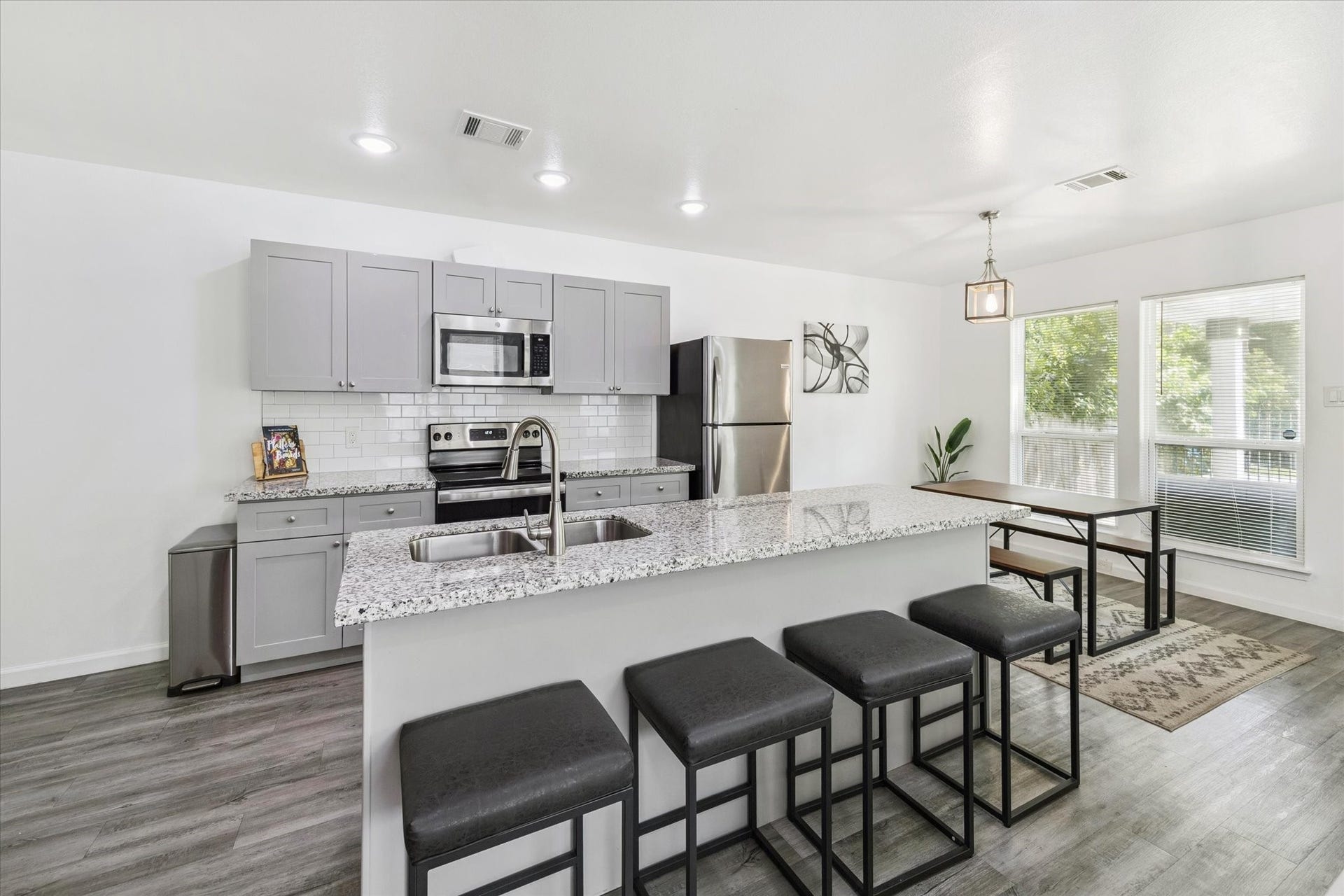 2631 Stevens Street, Houston, TX 77026 The front entry welcomes you with abundant natural light from oversized windows and a clean, open feel. Modern flooring and a sleek light fixture set the tone for the homes style