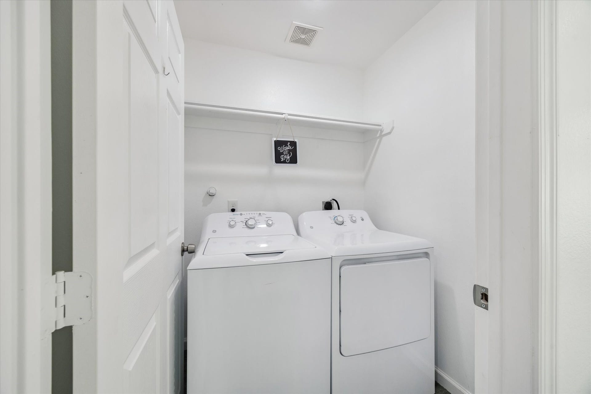 2631 Stevens Street, Houston, TX 77026 A dedicated laundry room includes overhead shelving for convenient storage. Easily accessible to every bedroom, this utility room adds everyday functionality to the home.