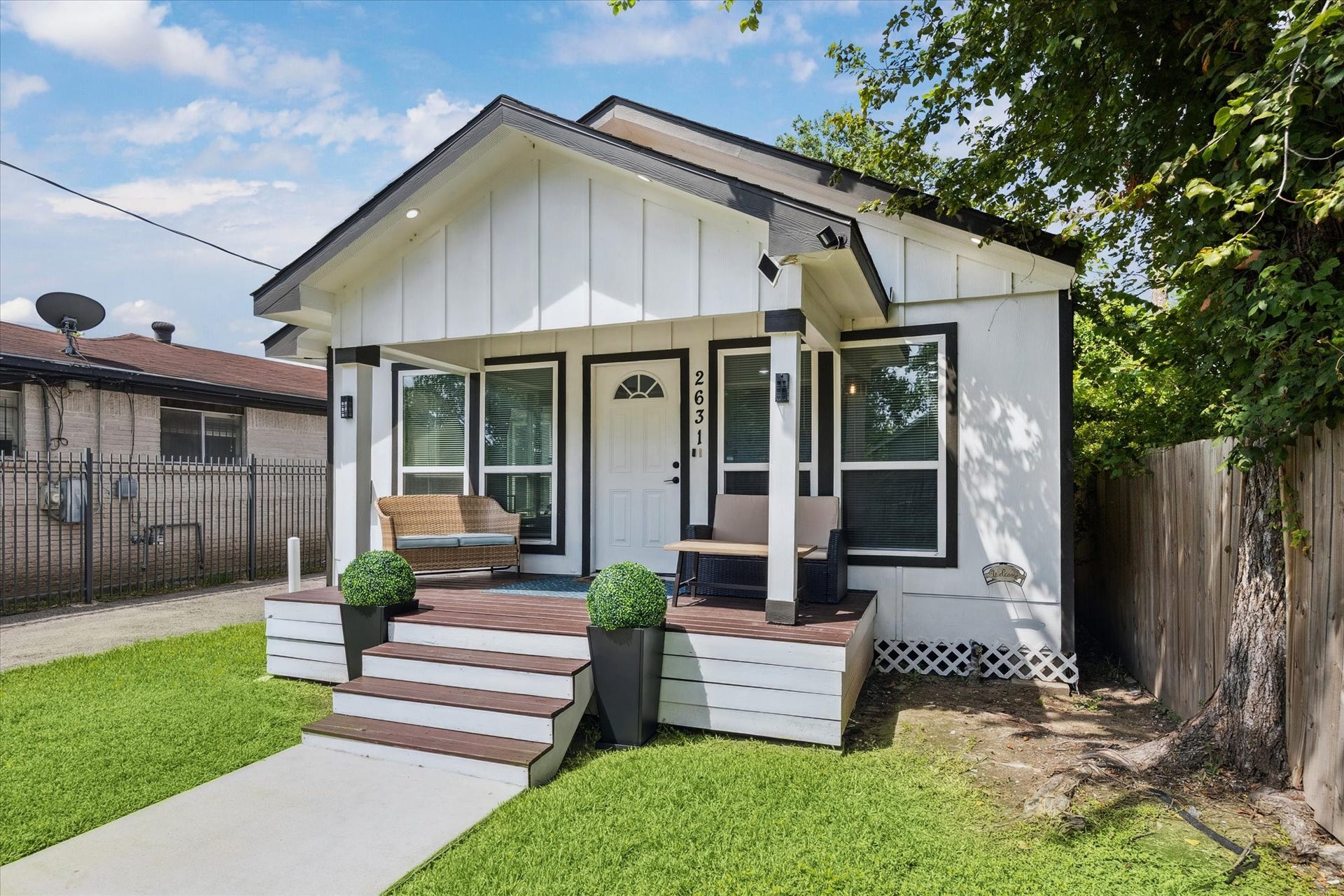 2631 Stevens Street, Houston, TX 77026 Freshly painted and full of charm, this modern bungalow features a classic black-and-white exterior and a cozy covered front porchperfect for morning coffee or winding down in the evening. Clean lines and updated finishes give it a crisp, stylish look from the moment you walk up.