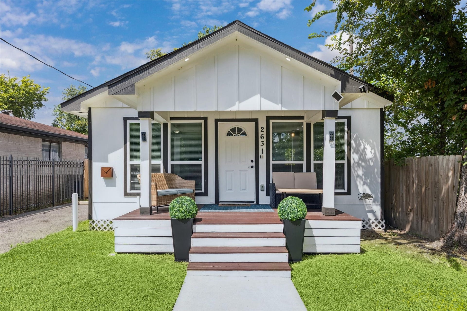 2631 Stevens Street, Houston, TX 77026 Freshly painted and full of charm, this modern bungalow features a classic black-and-white exterior and a cozy covered front porchperfect for morning coffee or winding down in the evening. Clean lines and updated finishes give it a crisp, stylish look from the moment you walk up.
