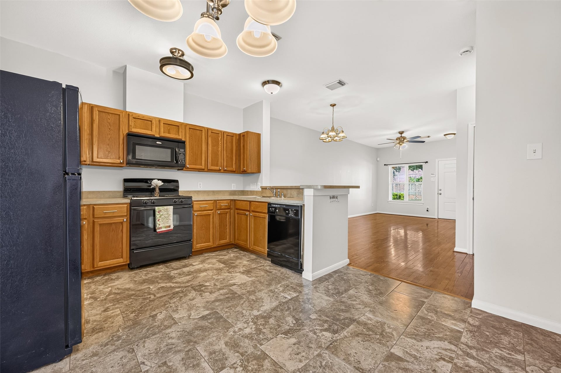 Generous cabinet storage and ample counter space make meal prep, organization, and everyday cooking easy and convenient.