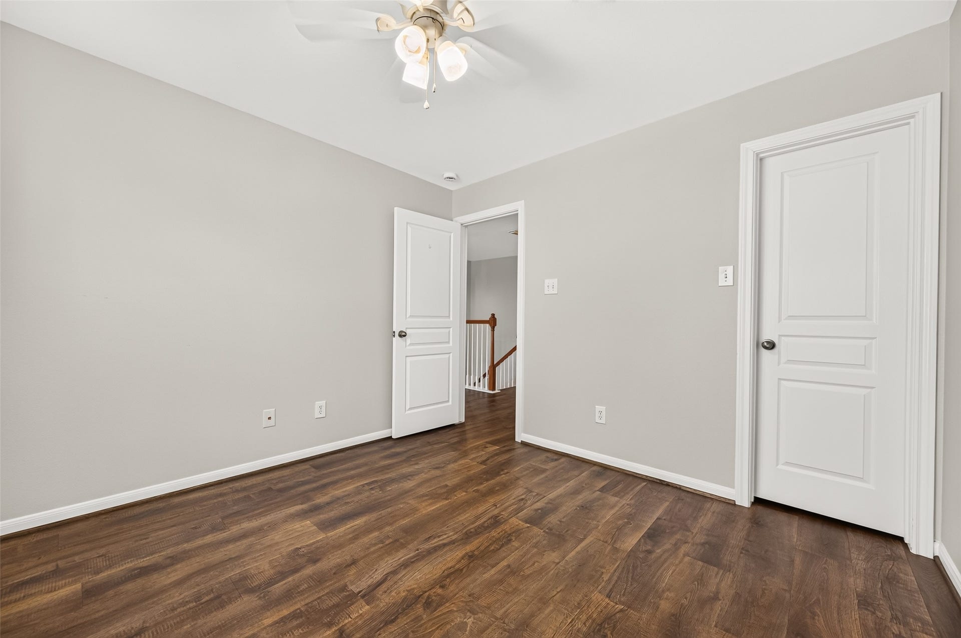 The guest bedroom also features attractive vinyl plank flooring and a spacious closet offering plenty of storage.