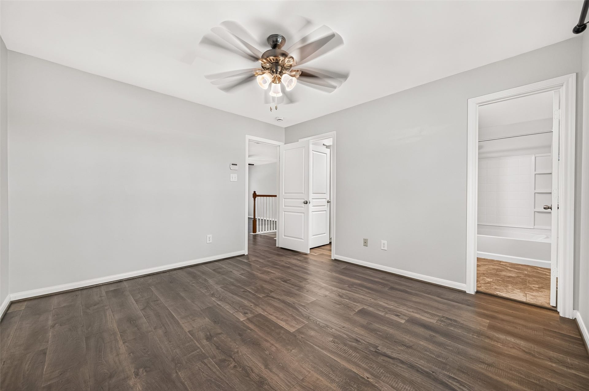 This spacious primary bedroom also boasts a generous walk-in closet and private en-suite bath for added comfort and convenience.