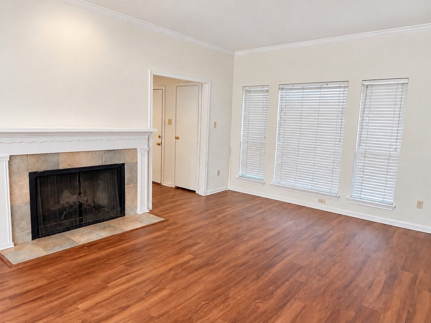 11711 Memorial Drive, #313, Houston, TX 77024 Inviting living room with tile-surrounded Fireplace