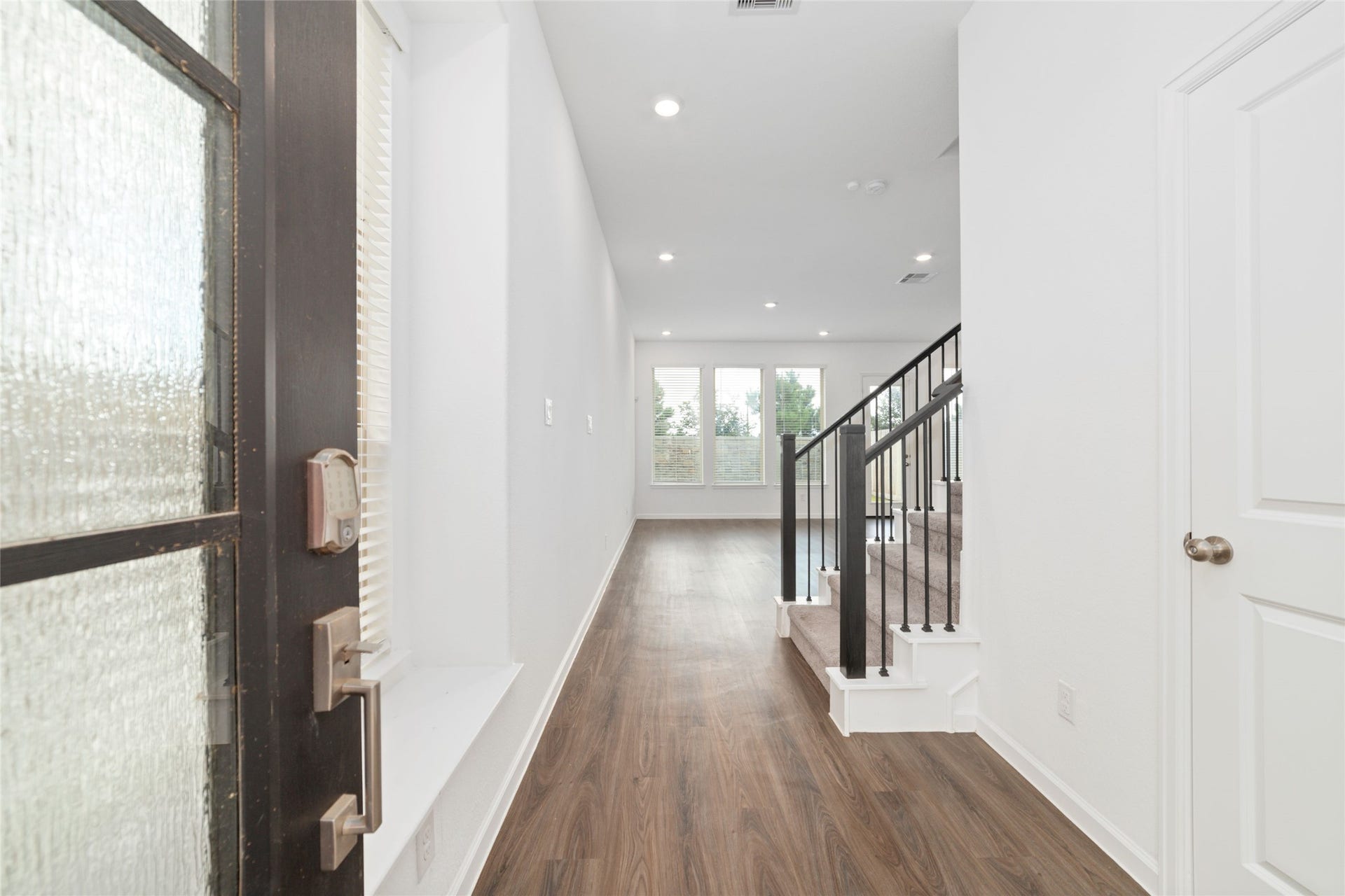 5719 Foggy Vine Court, Fulshear, TX 77441 Welcome in! Front entrance, half bath to the right.