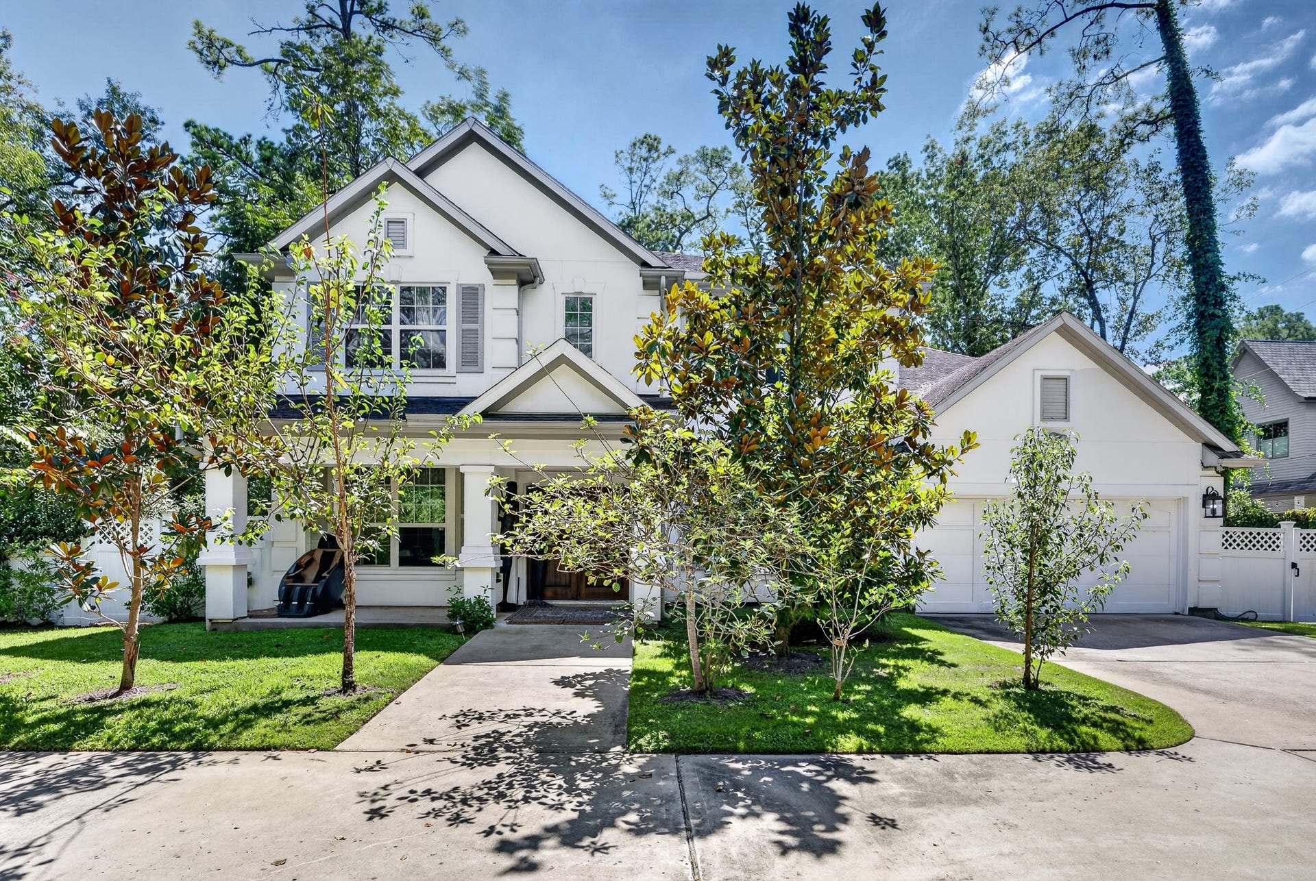 Impressive curb appeal with mature landscaping and a welcoming approach.