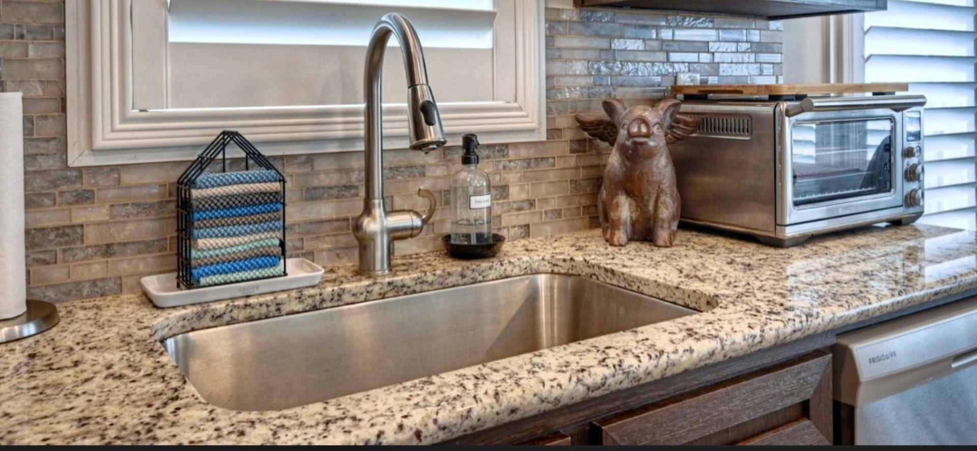 11720 Thousand Trails Road, #73, Willis, TX 77318 Window above the sink brings in natural light, while the tall curved faucet, surrounding counters & cabinetry offer everyday functionality.