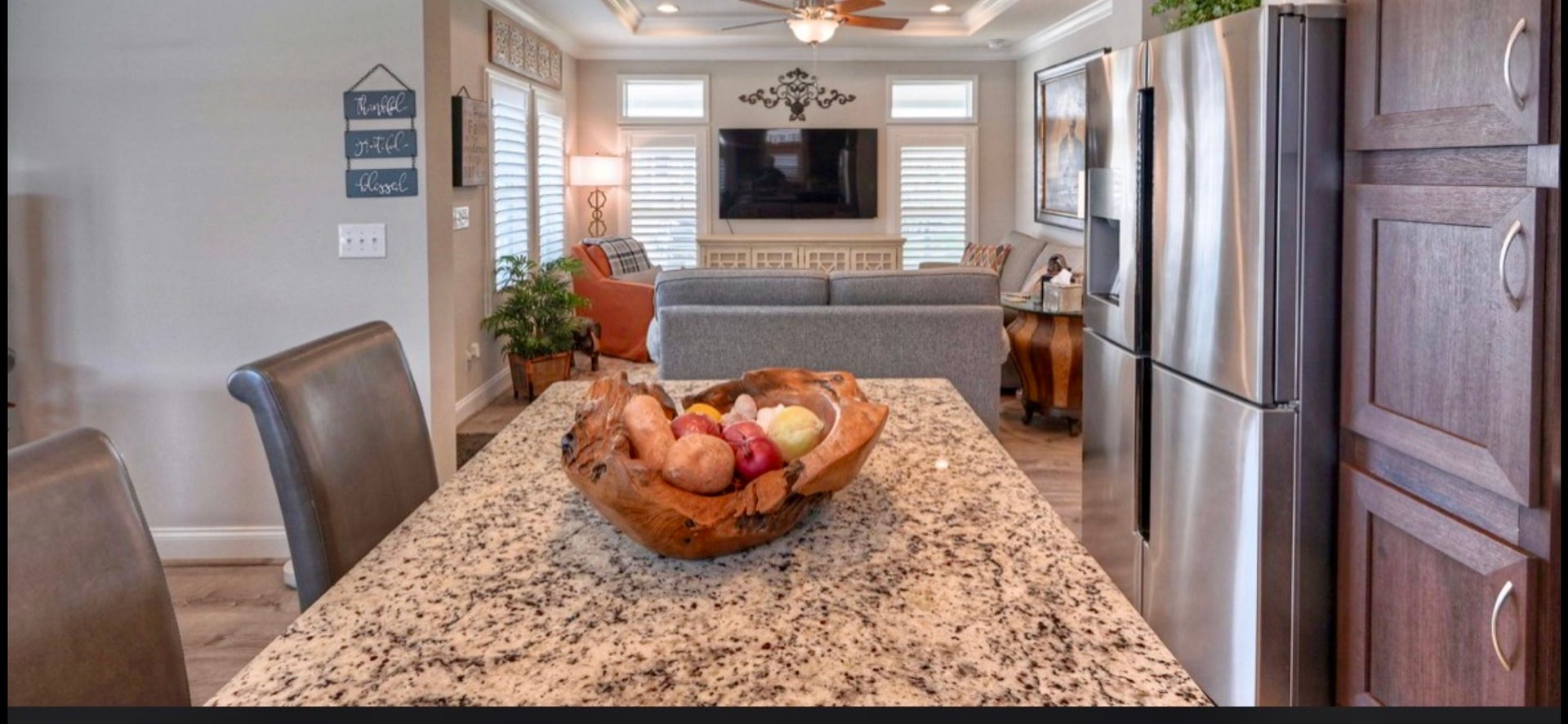 11720 Thousand Trails Road, #73, Willis, TX 77318 Generous breakfast bar provides casual seating & additional prep space while keeping the kitchen connected to the living area.