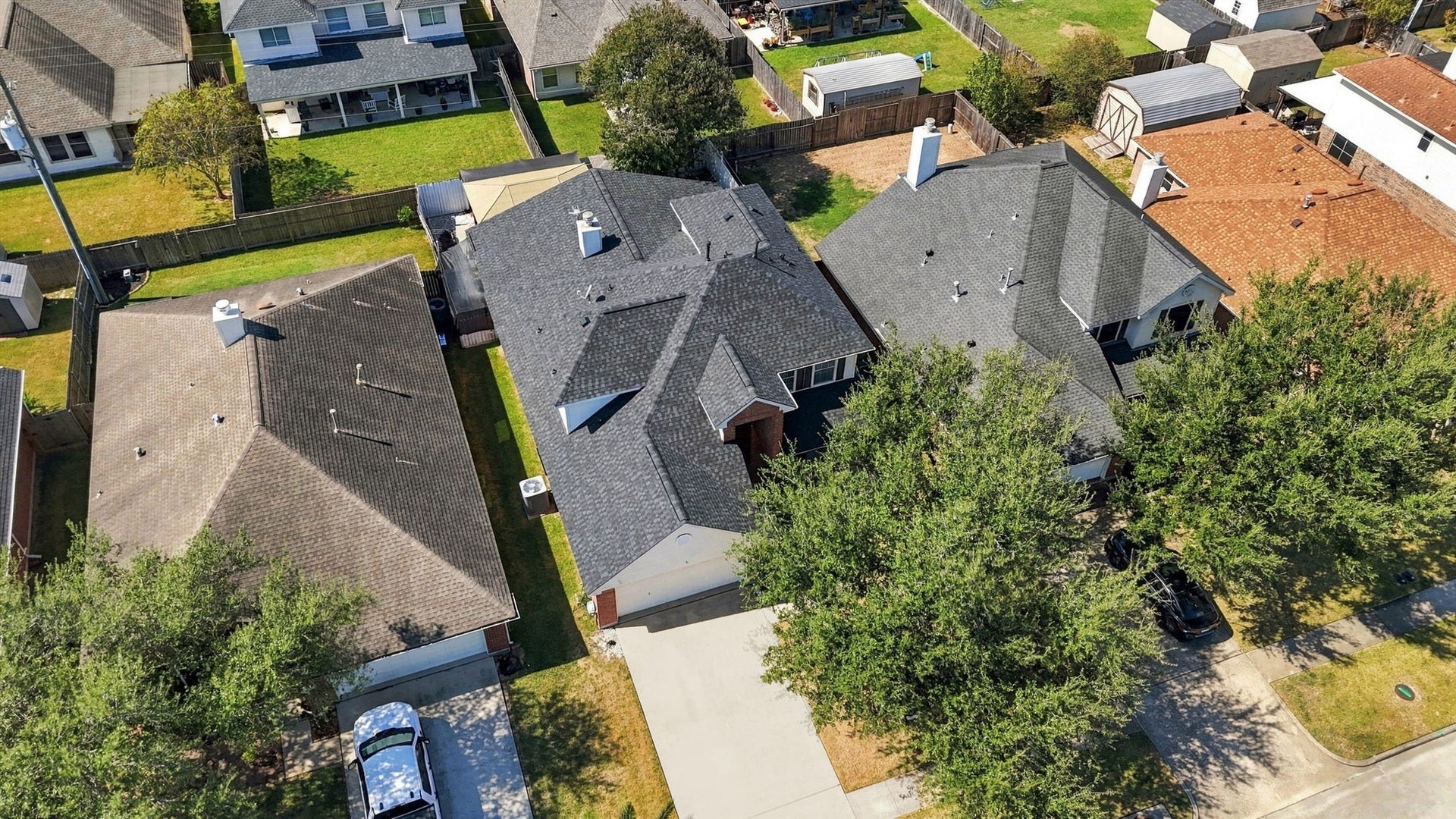 Nestled in a charming neighborhood, this home features a spacious backyard and a well-maintained roof, offering plenty of outdoor space for relaxation and recreation.