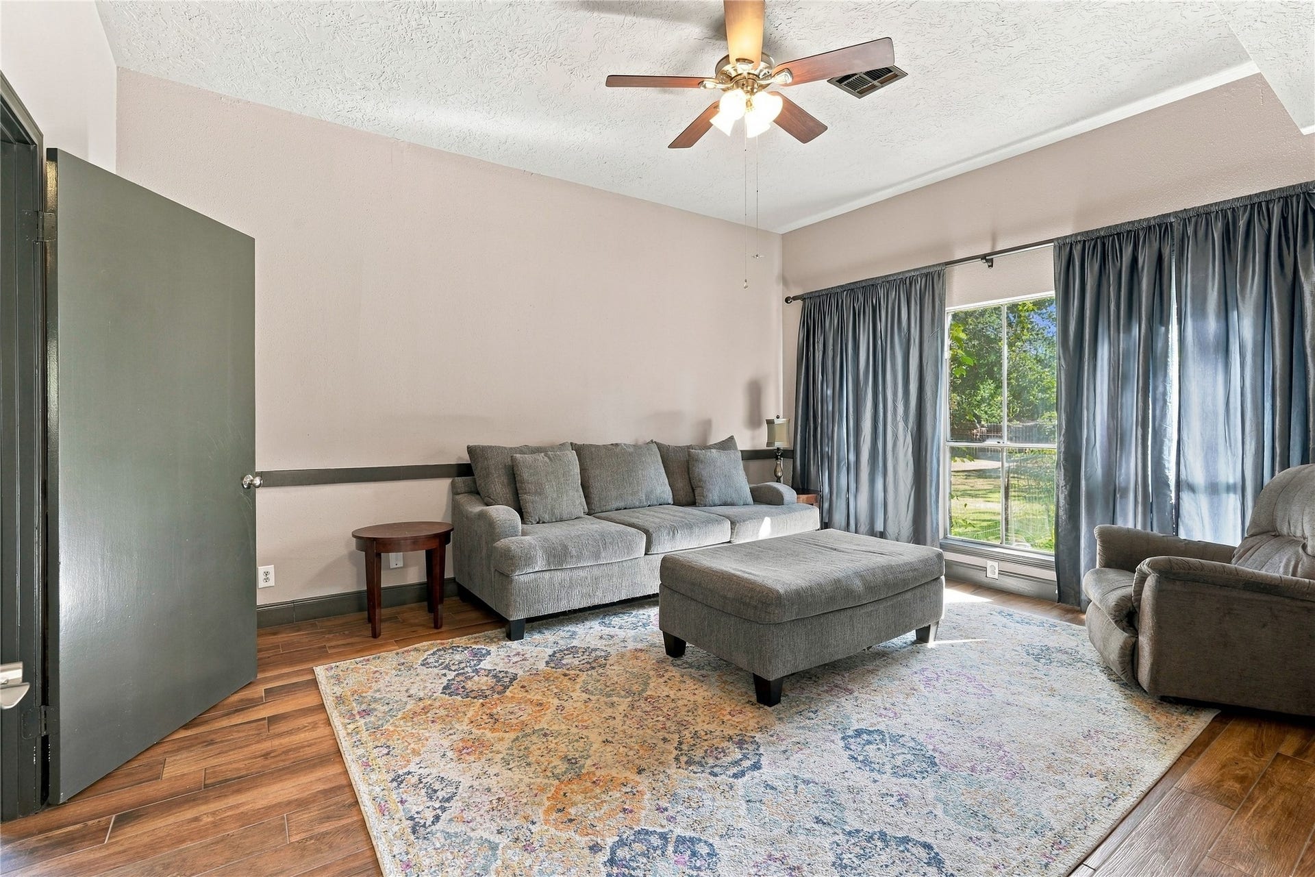 24904 Robin Hood Lane, Hockley, TX 77447 Additional family room view highlighting the spacious layout, natural light, and flexible furniture arrangement.