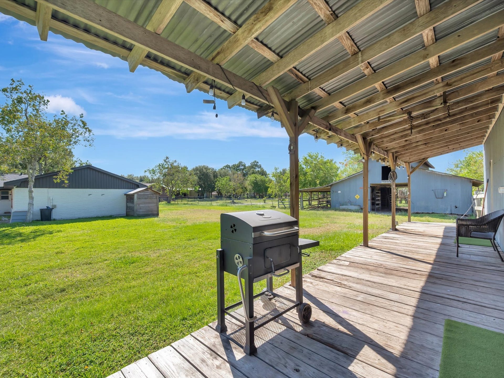 7230 Avenue L, Santa Fe, TX 77510 Beautiful front porch perfect for relaxing and enjoying the scenery.