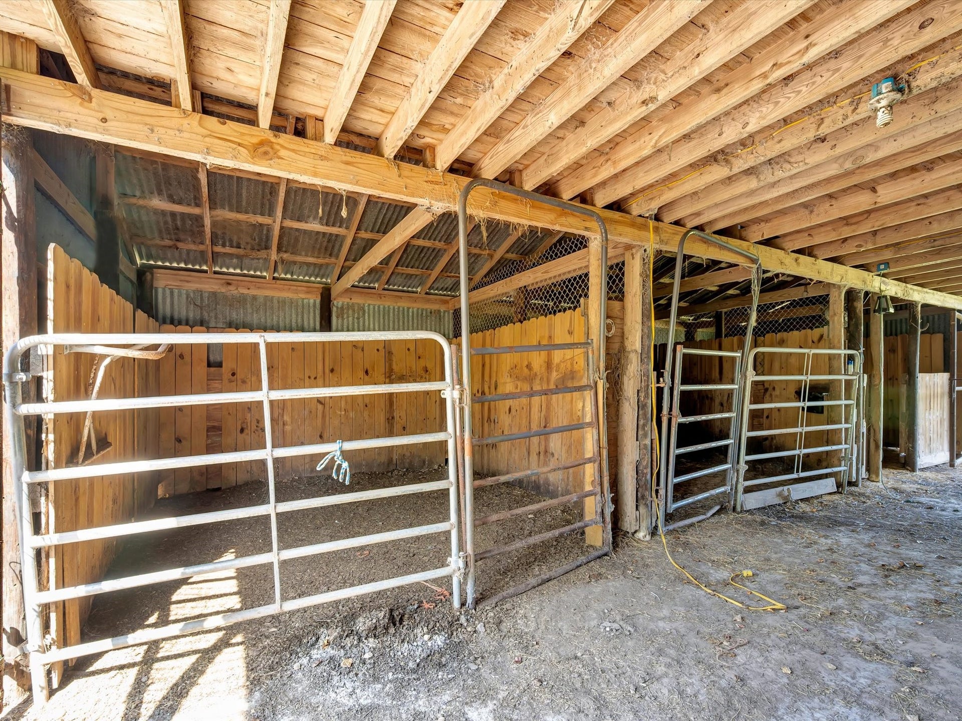7230 Avenue L, Santa Fe, TX 77510 Spacious horse barn with stalls.
