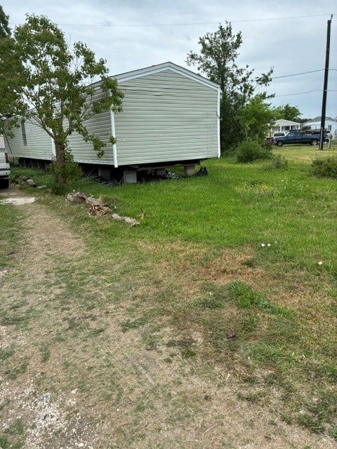 Property photo for 115 Gulls Cut Street, Baytown, TX
