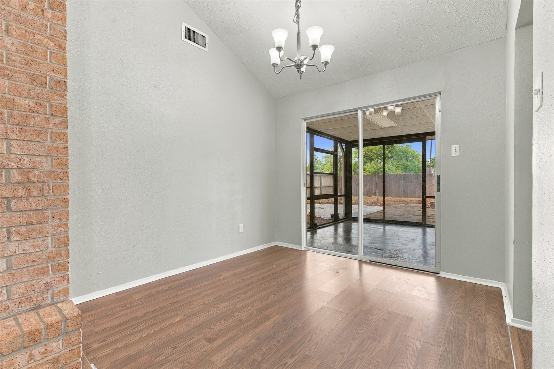 3011 Helmsley Drive, Pearland, TX 77584 Dining area sits beside the kitchen and opens to the sunroom, creating an easy flow for everyday meals and entertaining.