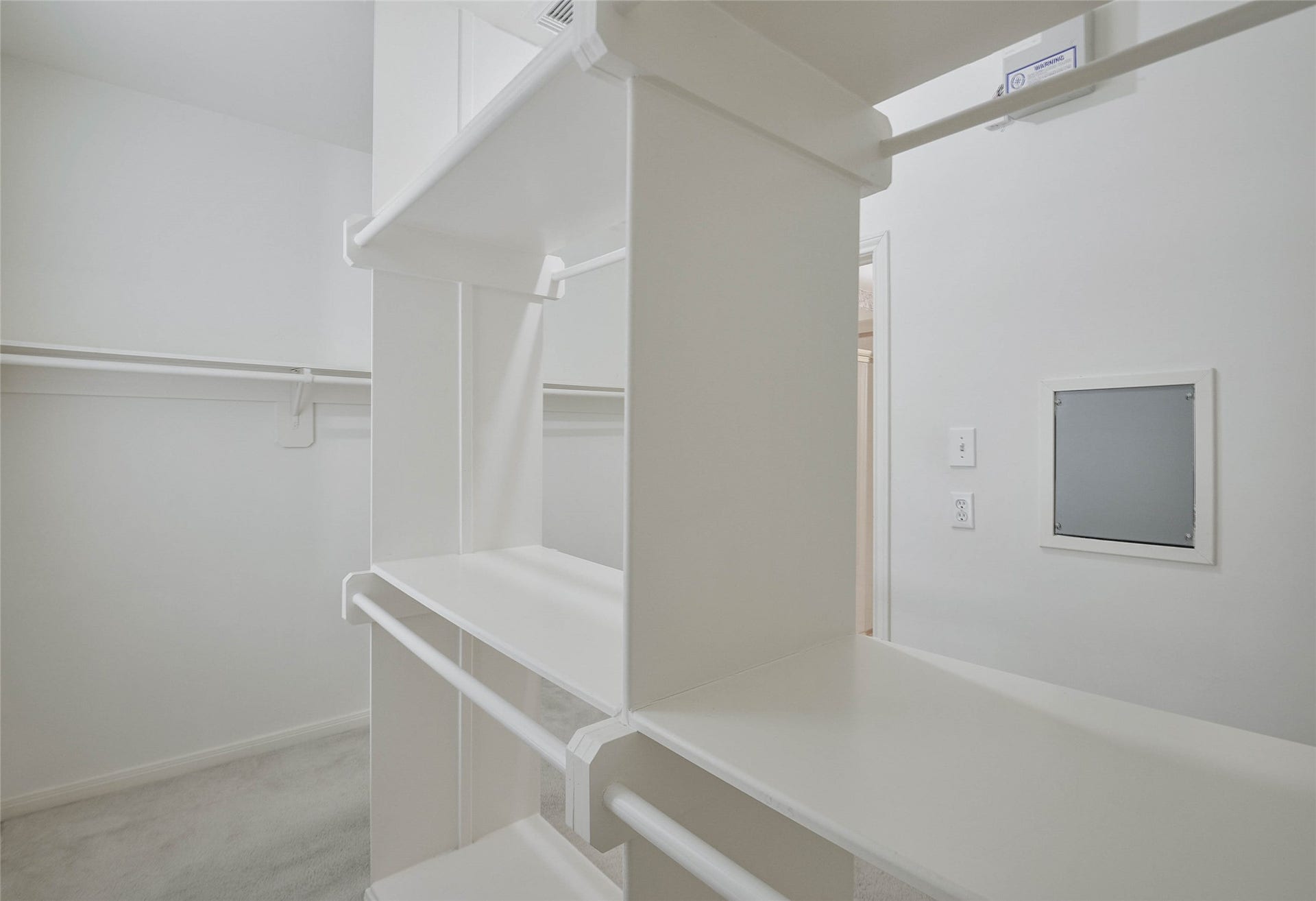 7023 Timber Edge Lane Lane, Humble, TX 77346 Spacious walk-in closet with ample shelving and hanging space for organized storage.