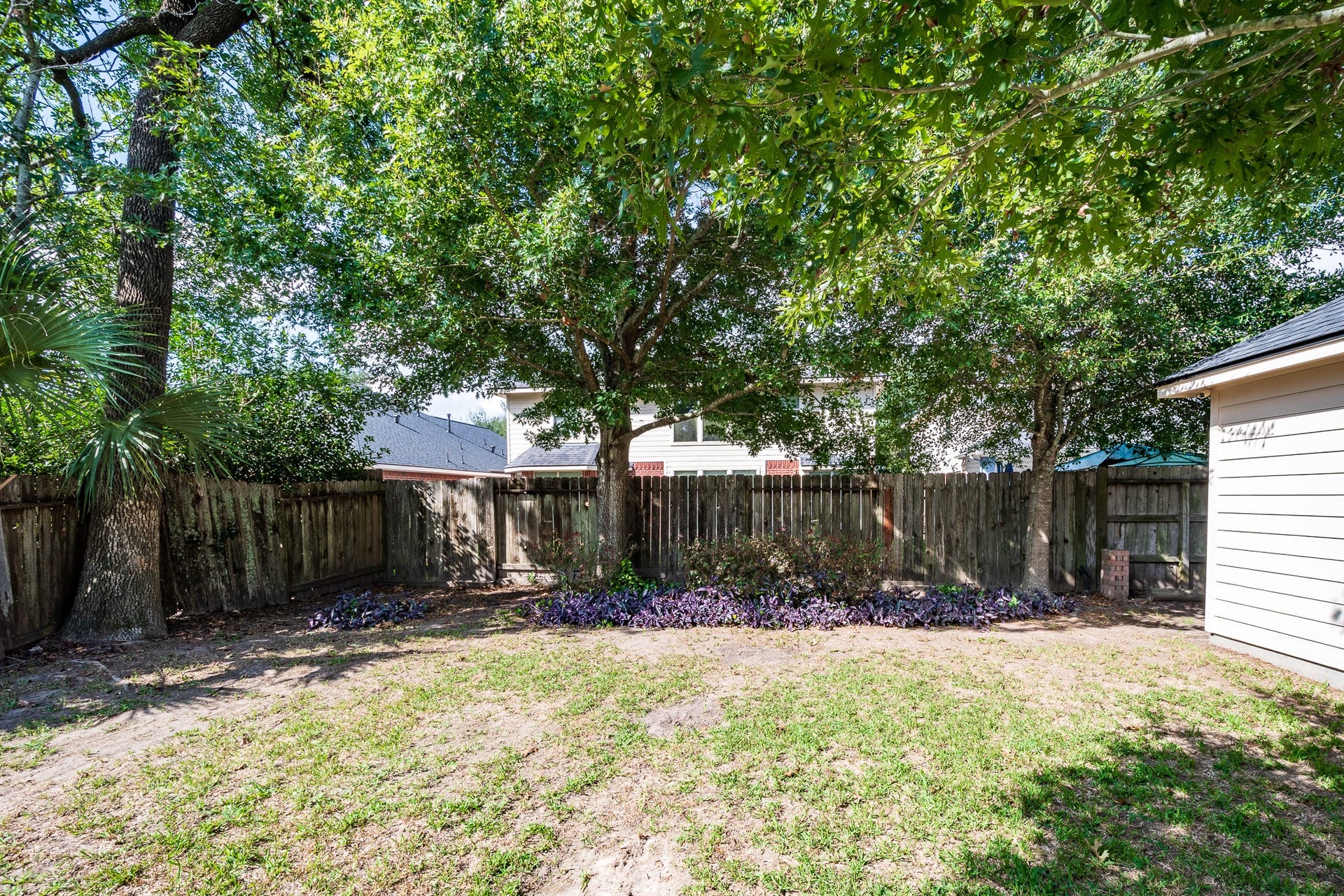 7023 Timber Edge Lane Lane, Humble, TX 77346 Fully Fenced Backyard perfect for a growing family, and their outdoor activities.