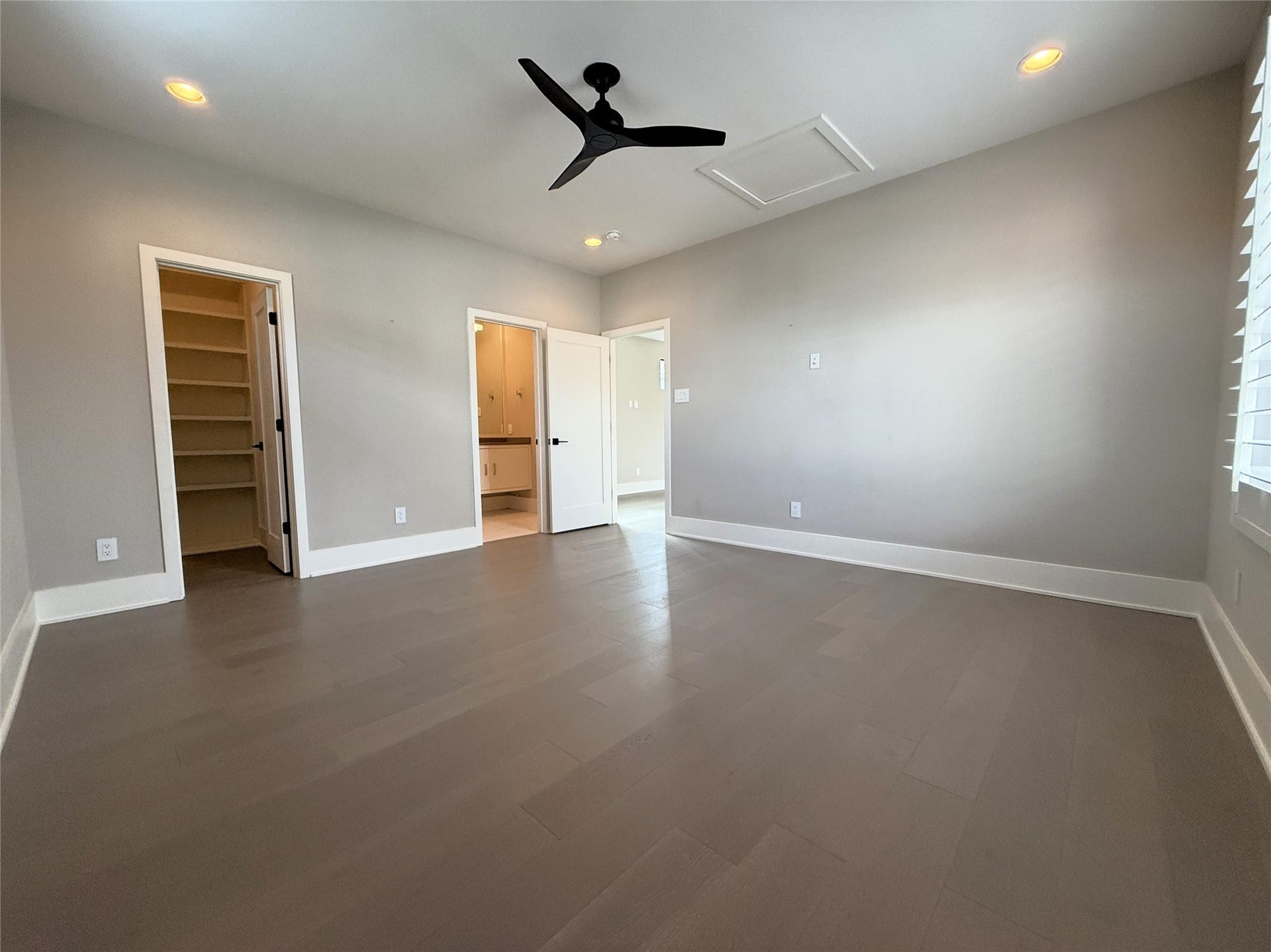 Alternate view of the bedroom. Notice the private entrance to the bathroom in addition to an entrance from the living room.
