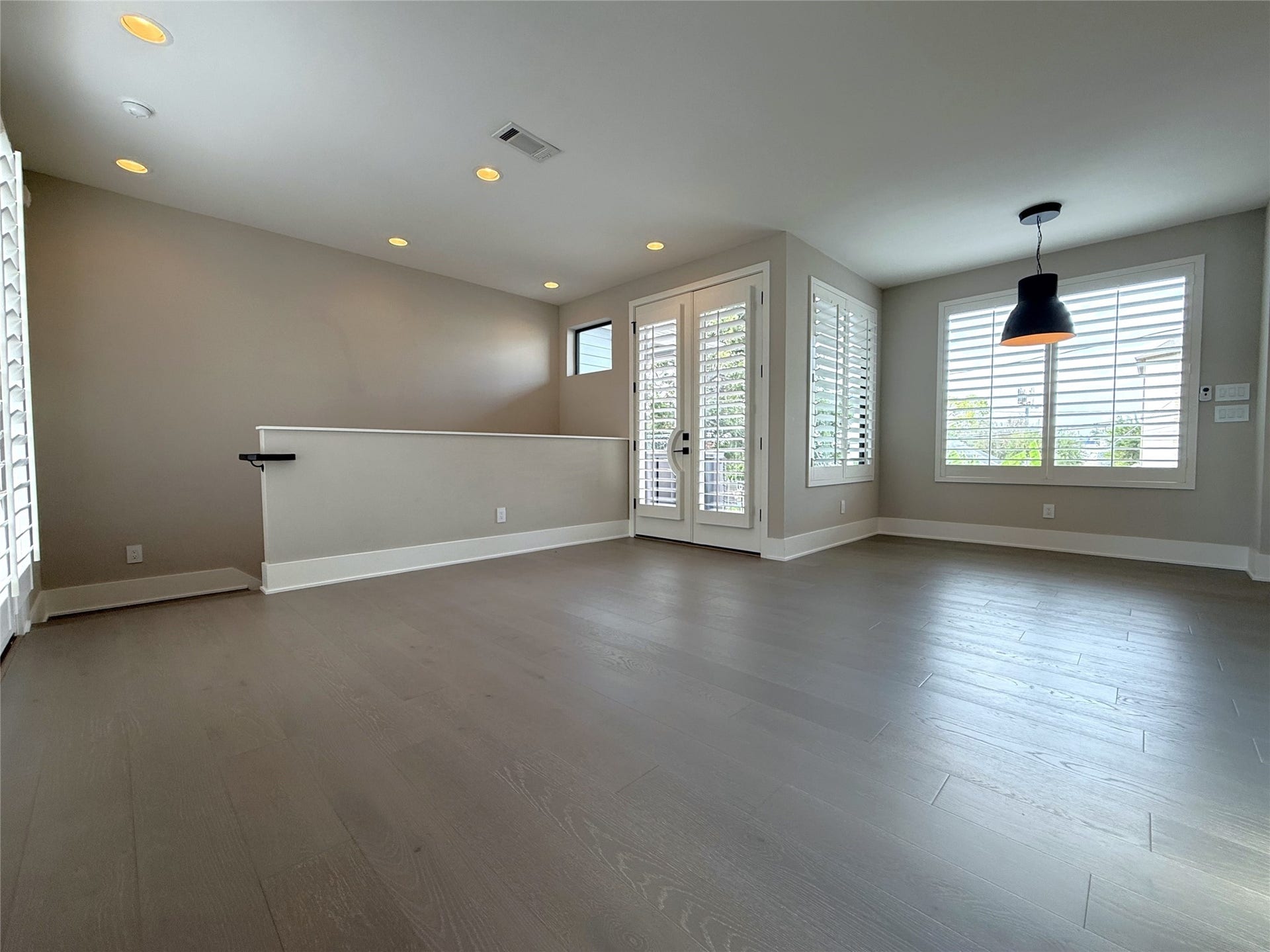 Bring a small dining table, or bring a large one, the open space is flexible for either. French doors open in from the main balcony. The previous tenant placed her desk in this space.