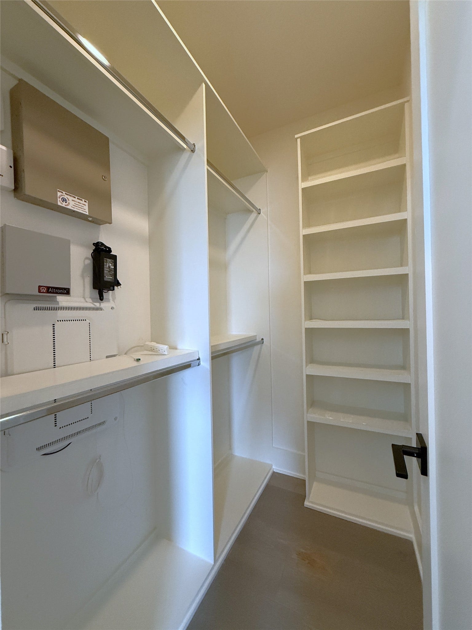 The bedroom offers a walk-in closet with built-in shelving.