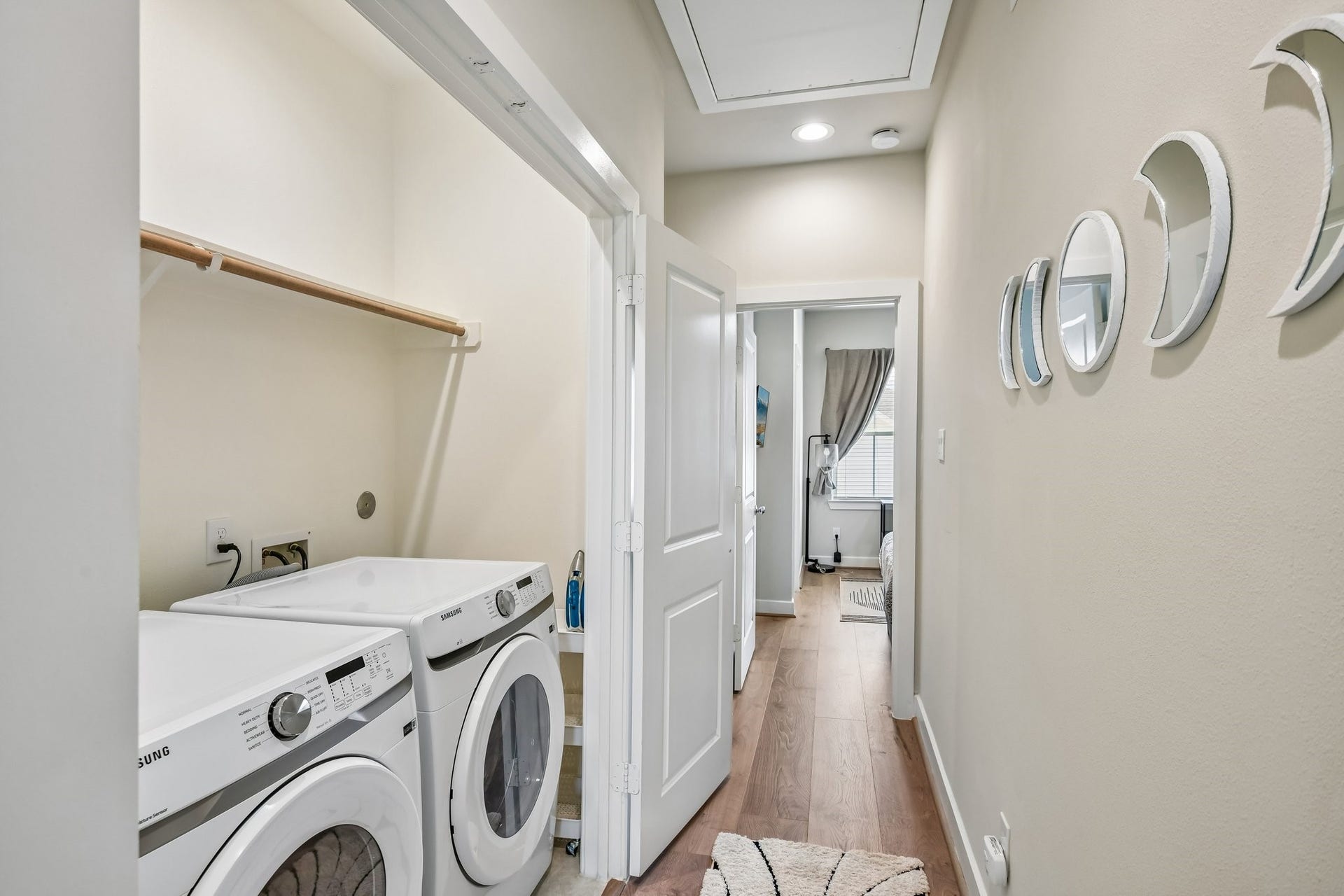 6314 Chelsea Falls Lane, Houston, TX 77008 Hallway located on the third floor with laundry room