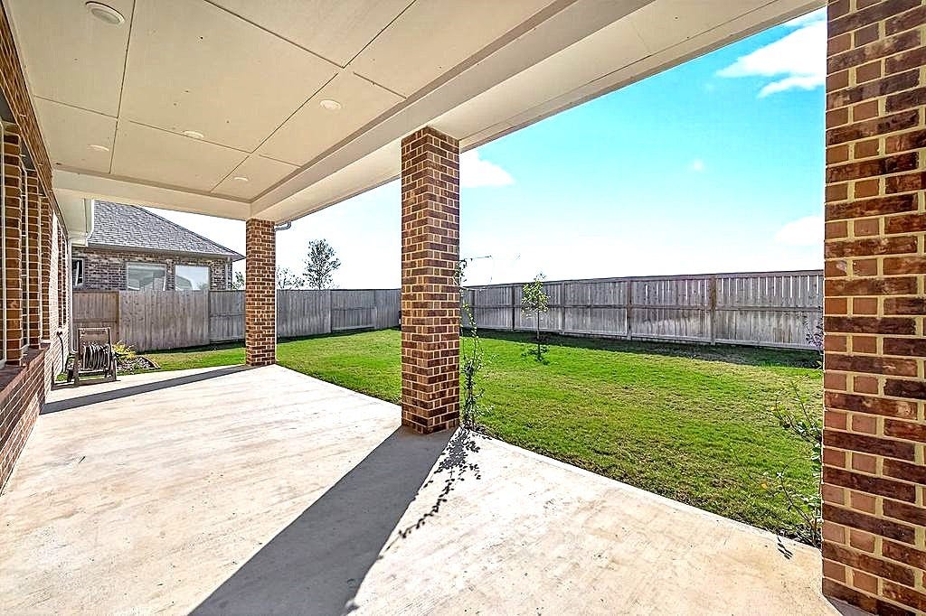 10010 Starry Night Lane, Manvel, TX 77578 WOW!! Oversize extended patio with no rear neighbors for great sky views