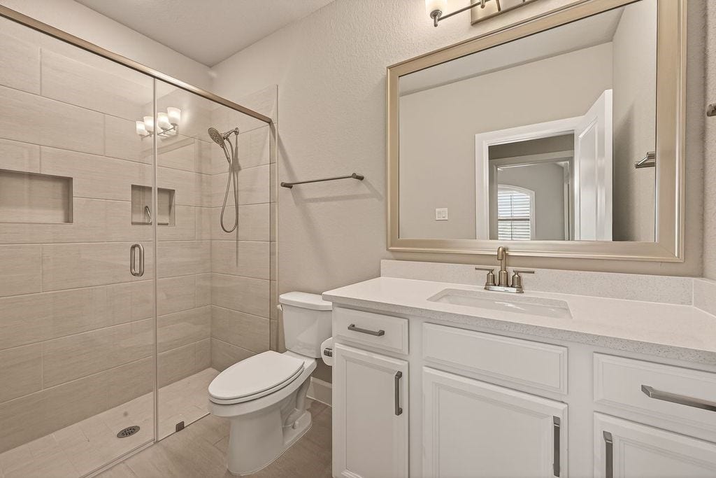10010 Starry Night Lane, Manvel, TX 77578 Full bath 2 with walk in shower upgrade option