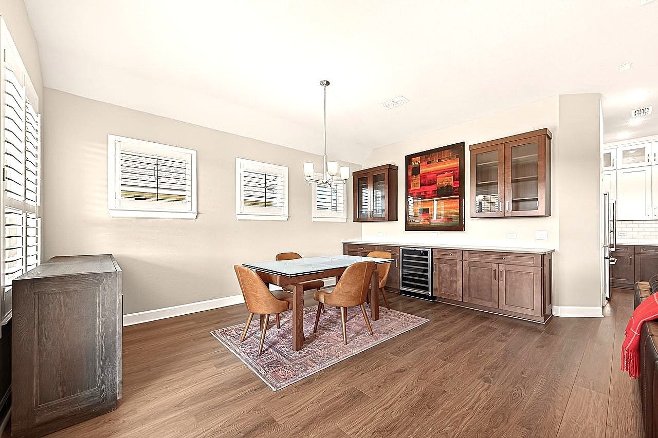 10010 Starry Night Lane, Manvel, TX 77578 Dining area with additional cabinet upgrade