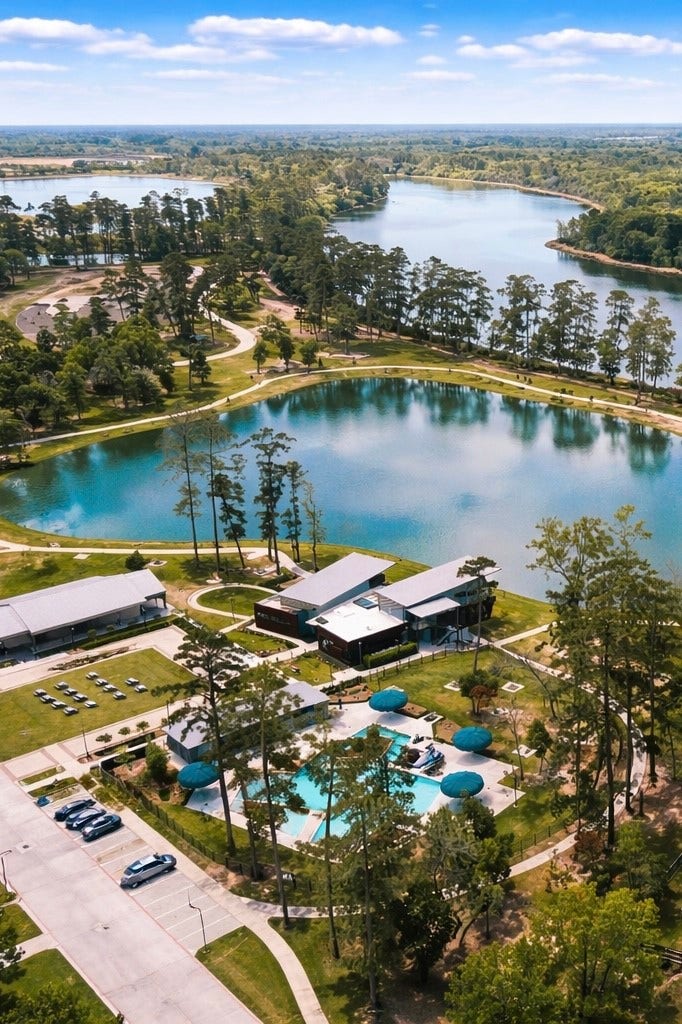 Discover a home surrounded by serene lakes and an impressive trail system, perfect for nature lovers seeking adventure and tranquility right at their doorstep.