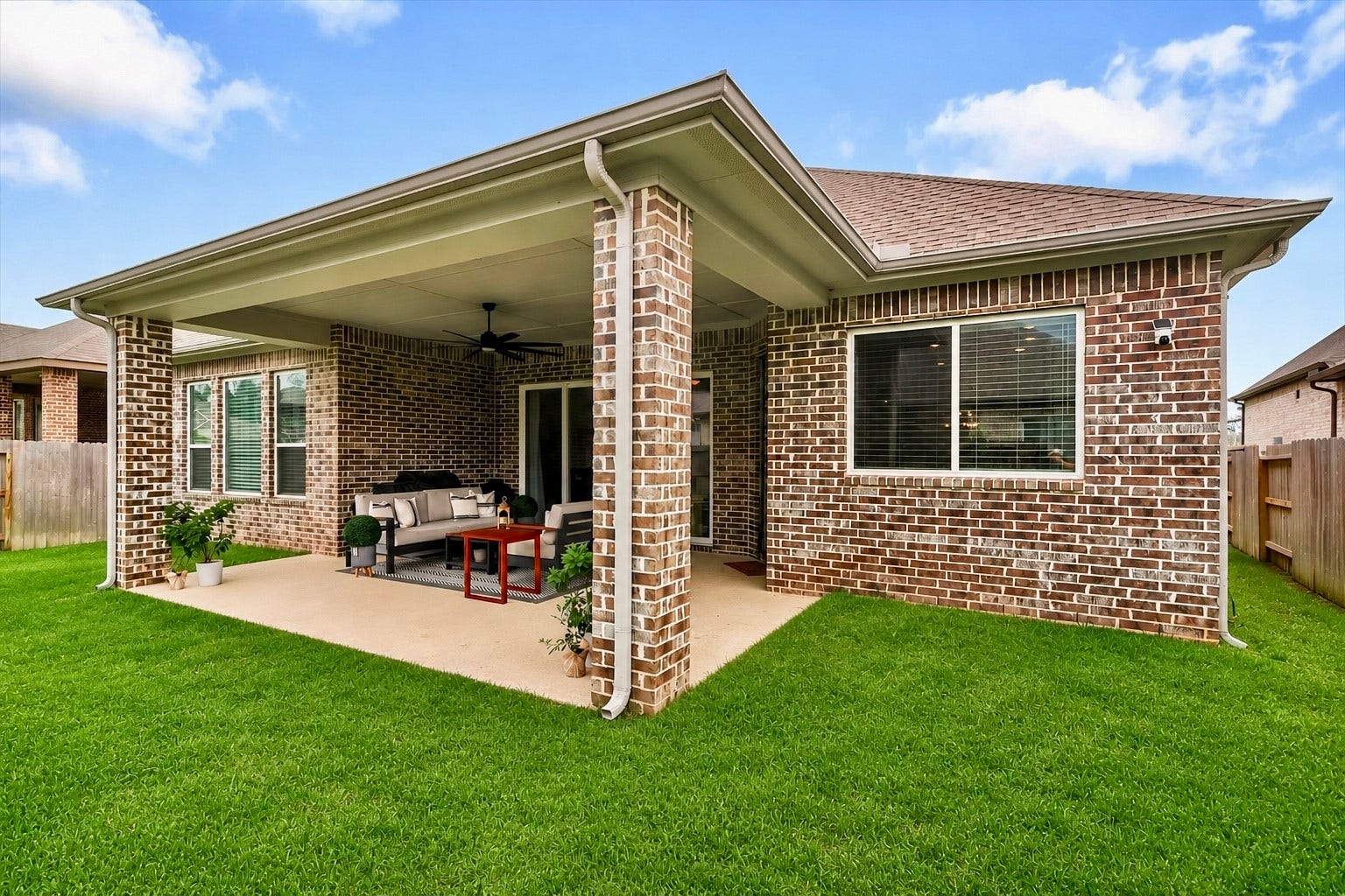 spacious covered patio, perfect for outdoor relaxation and entertaining