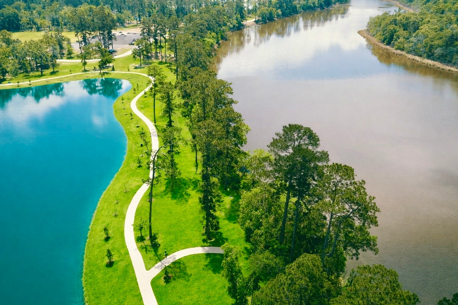Picturesque paths along a tranquil river and a shimmering lake.