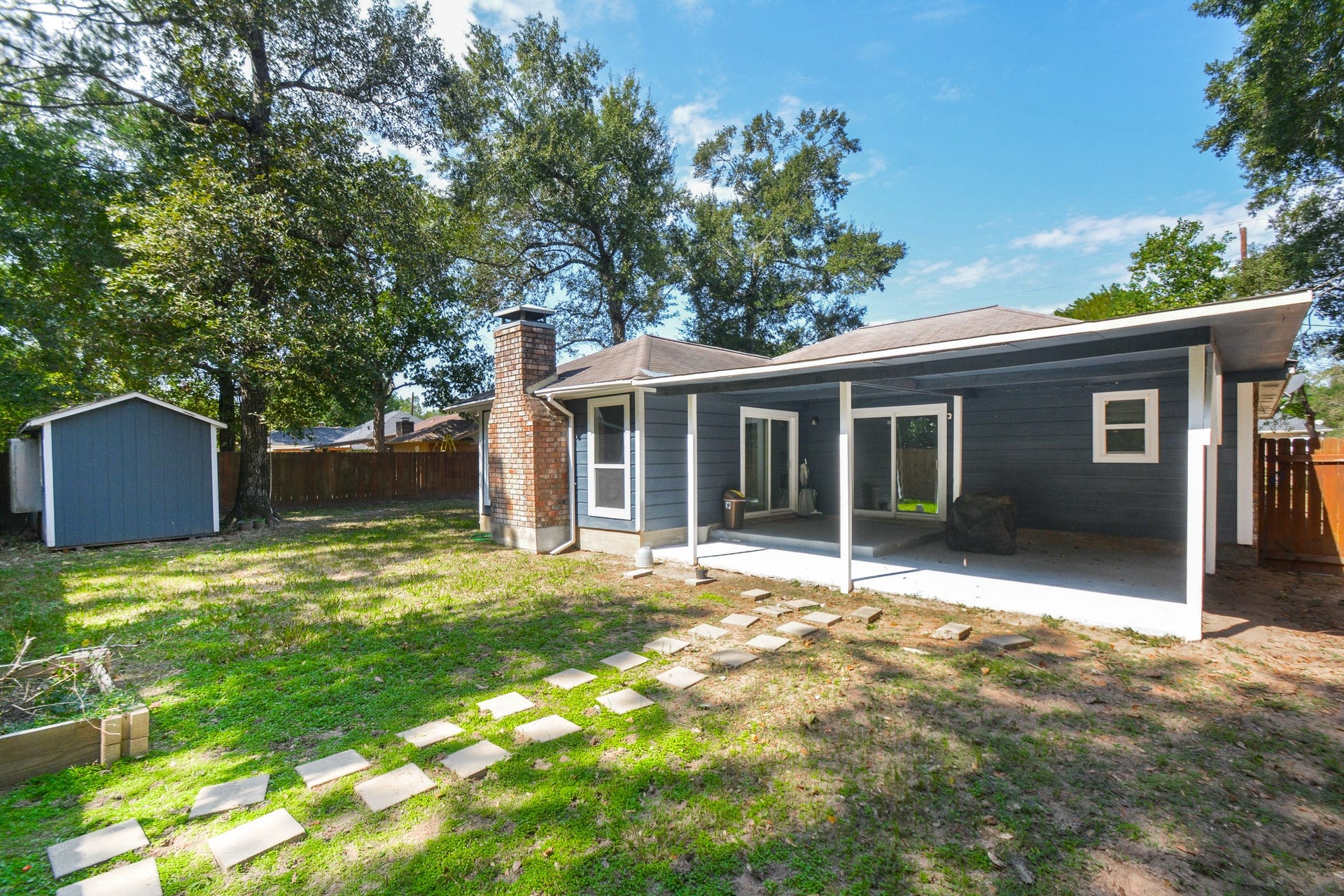 116 Oakmont Drive, Conroe, TX 77301 View of the back elevation with it's covered patio!