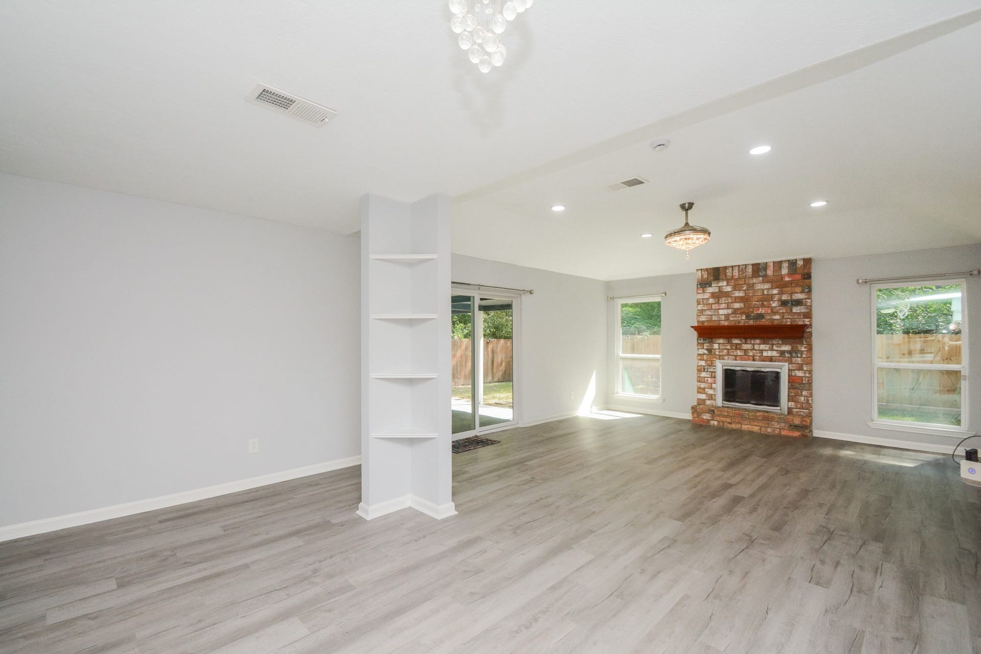 116 Oakmont Drive, Conroe, TX 77301 View from the kitchen overlooking the dining & den area.