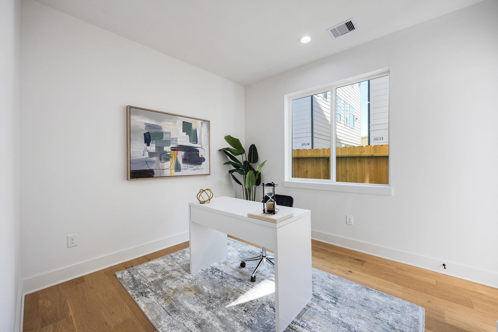First floor bedroom with full attached bath can be utilized as a home office/flex space.