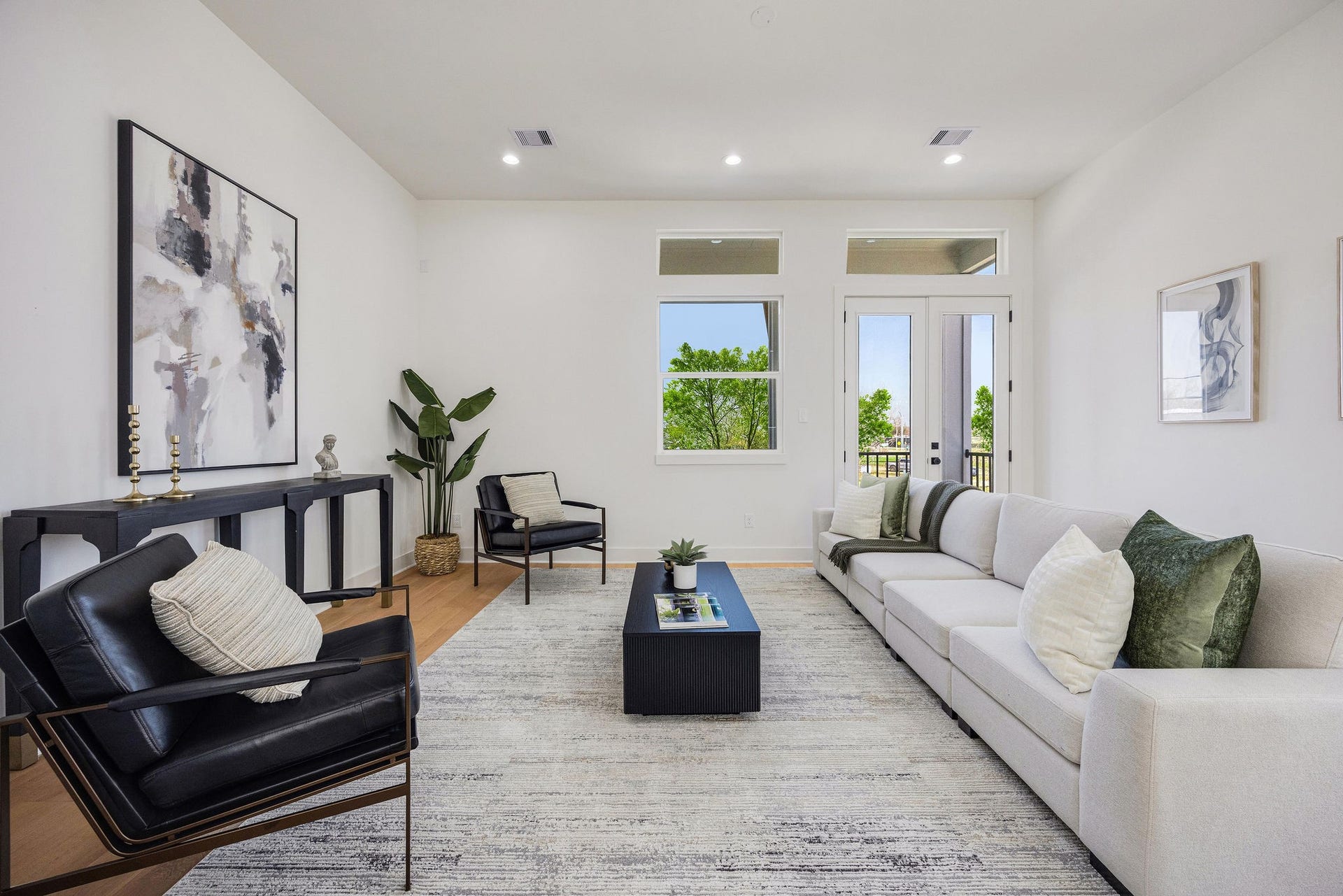 Elegant open-concept dining and living area with modern finishes and abundant natural light.