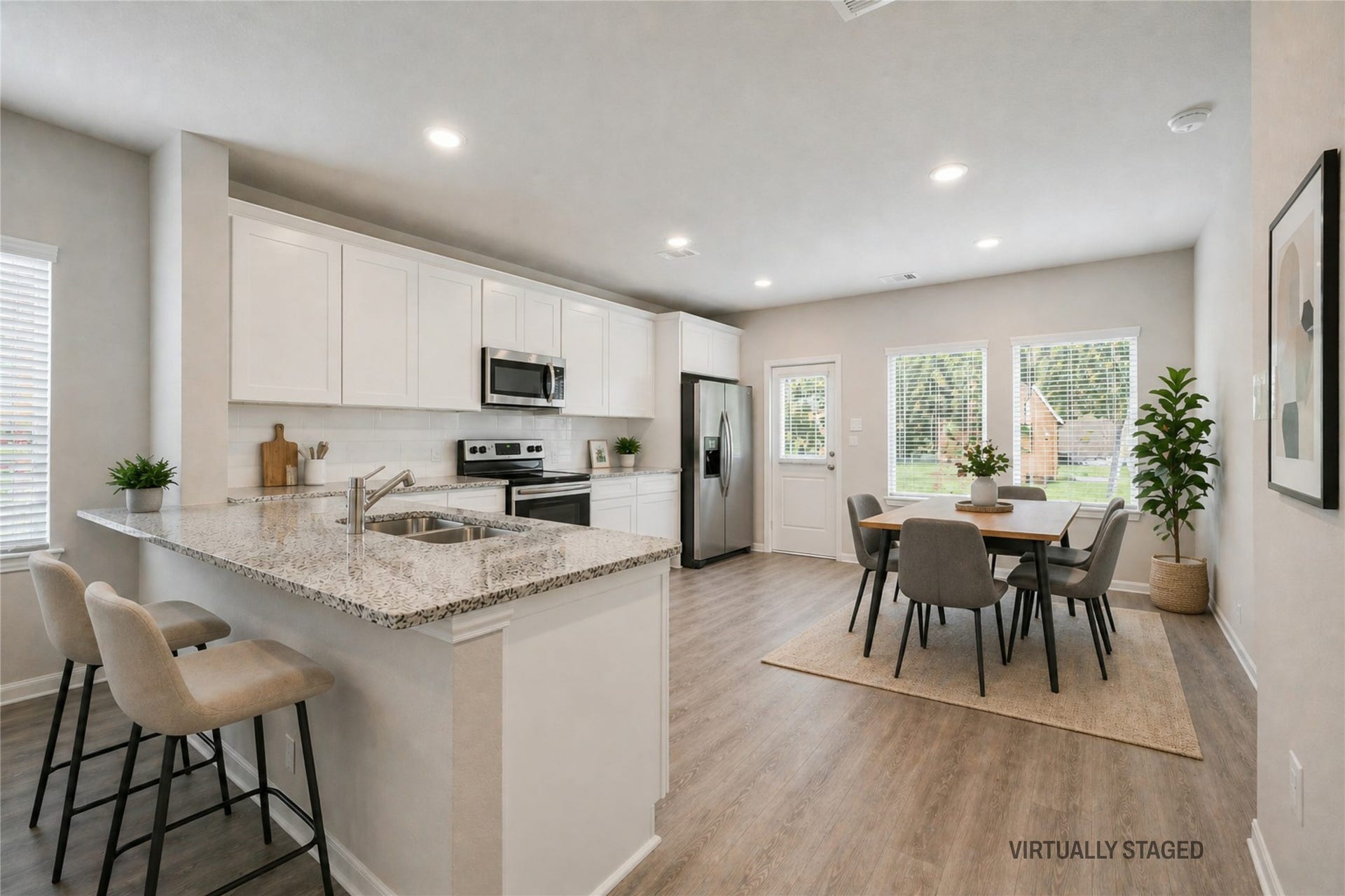 2022 Kansas Street, La Marque, TX 77568 Virtually staged photo of Breakfast Bar and Kiitchen.