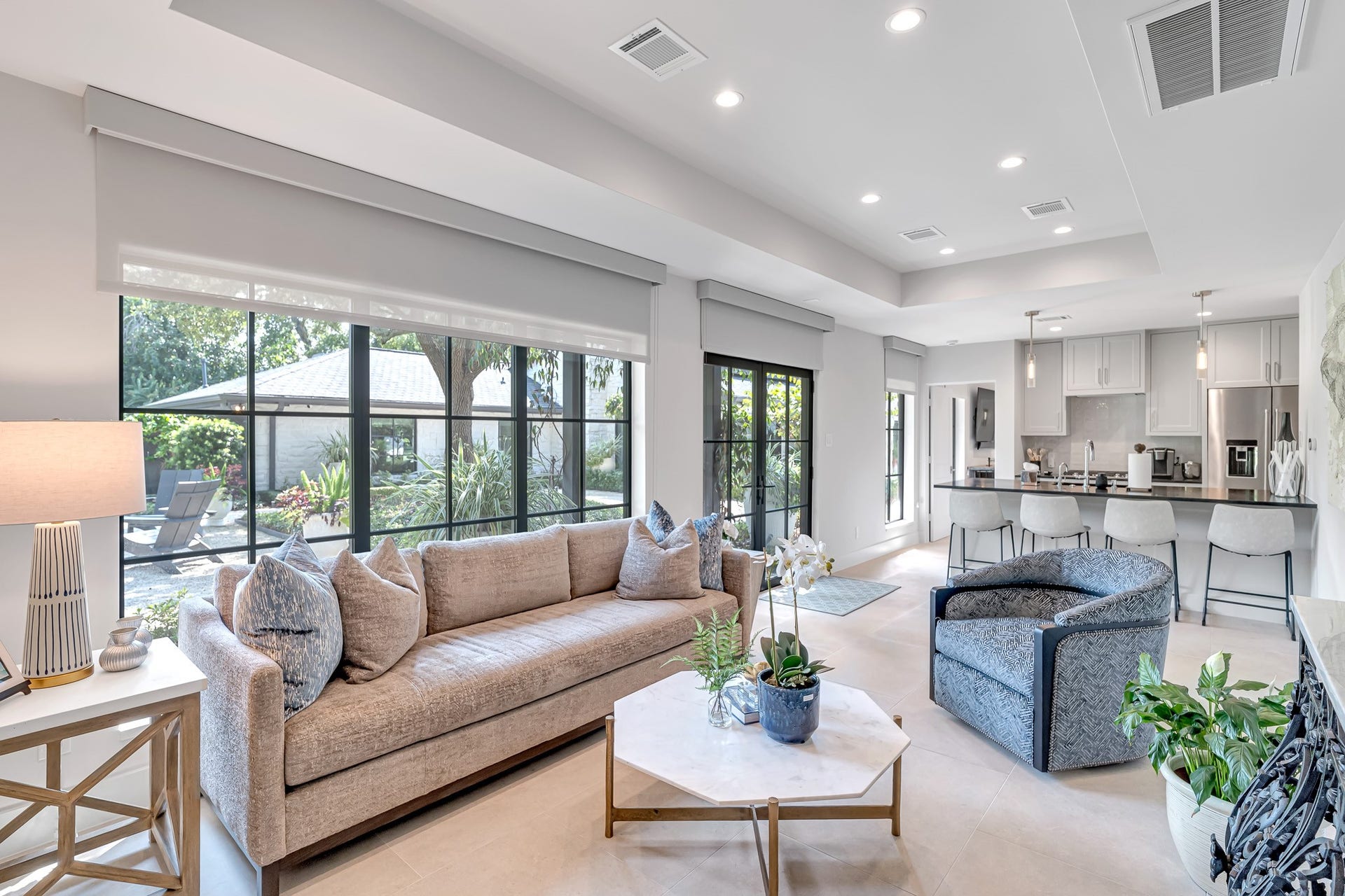 Guest suite with beautifully deisgned living room and floor to ceiling windows.