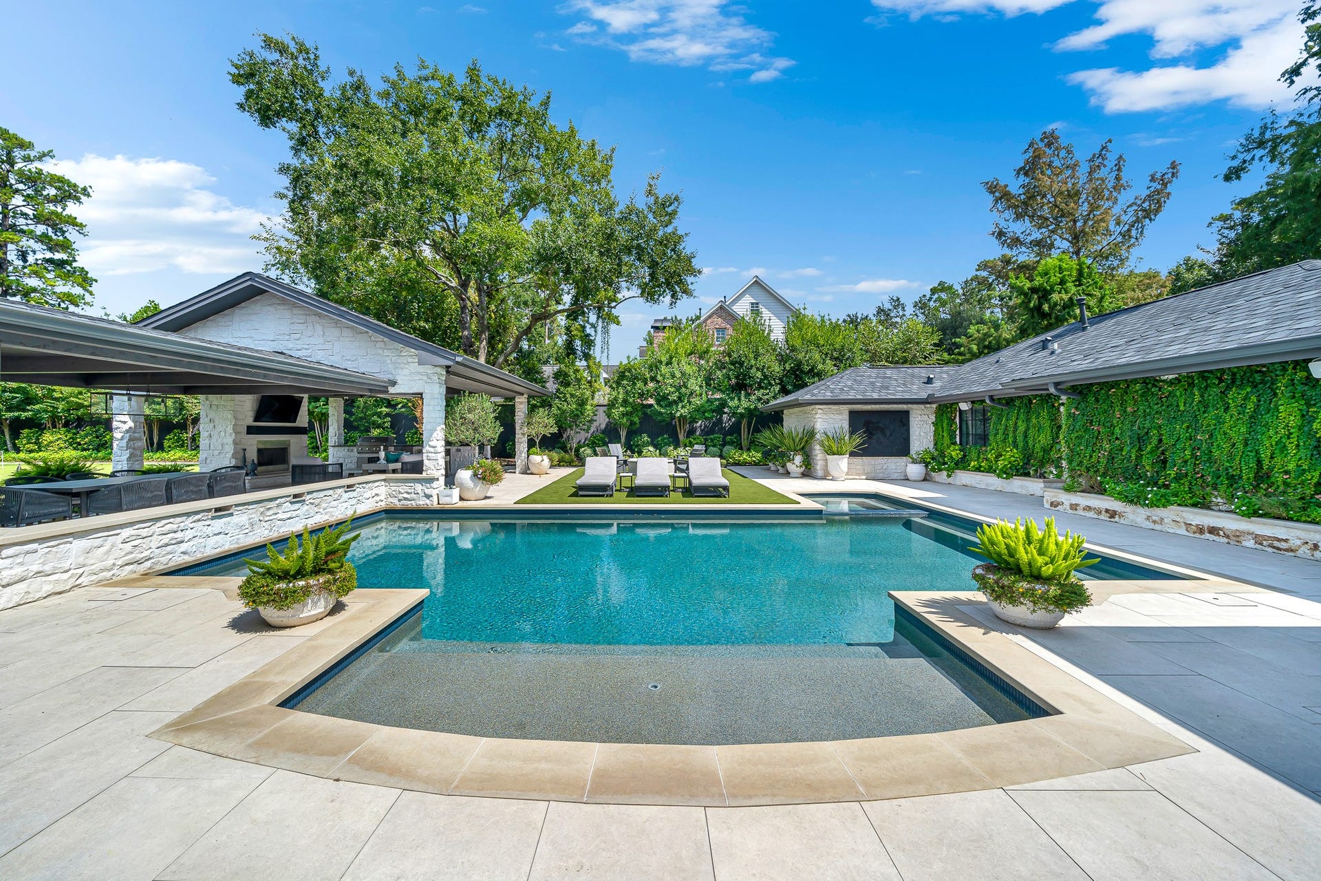 PebbleTec finish swimming pool with a dedicated pool chiller.