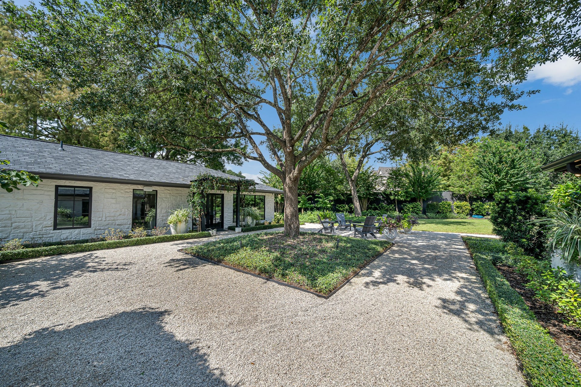 Breathtaking backdrop of lush greenery creates a sense of tranquility and privacy.