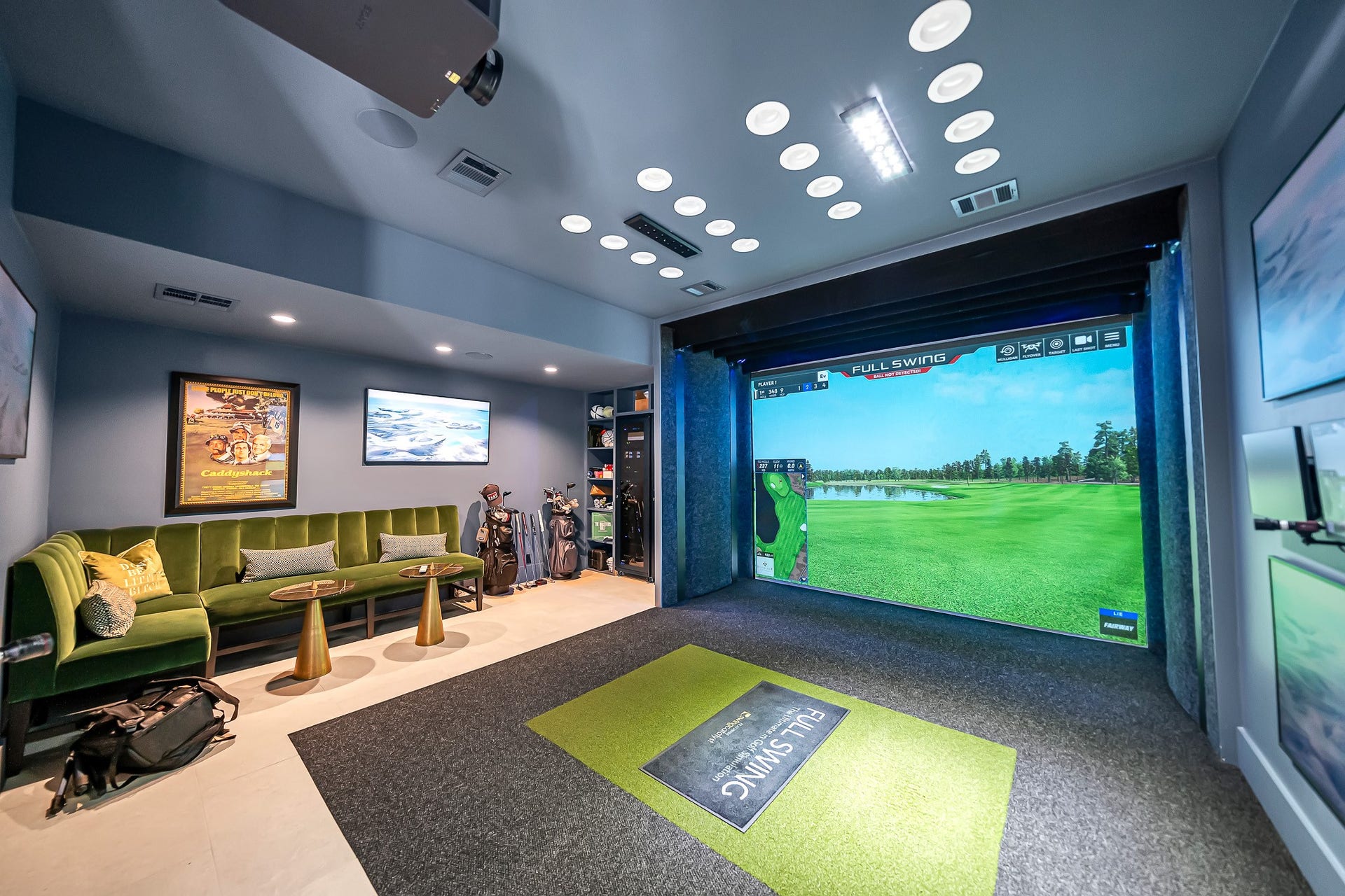 Full swing golf simulator offering an immersive indoor experience with gold and a variety of additional sports games for entertainment.