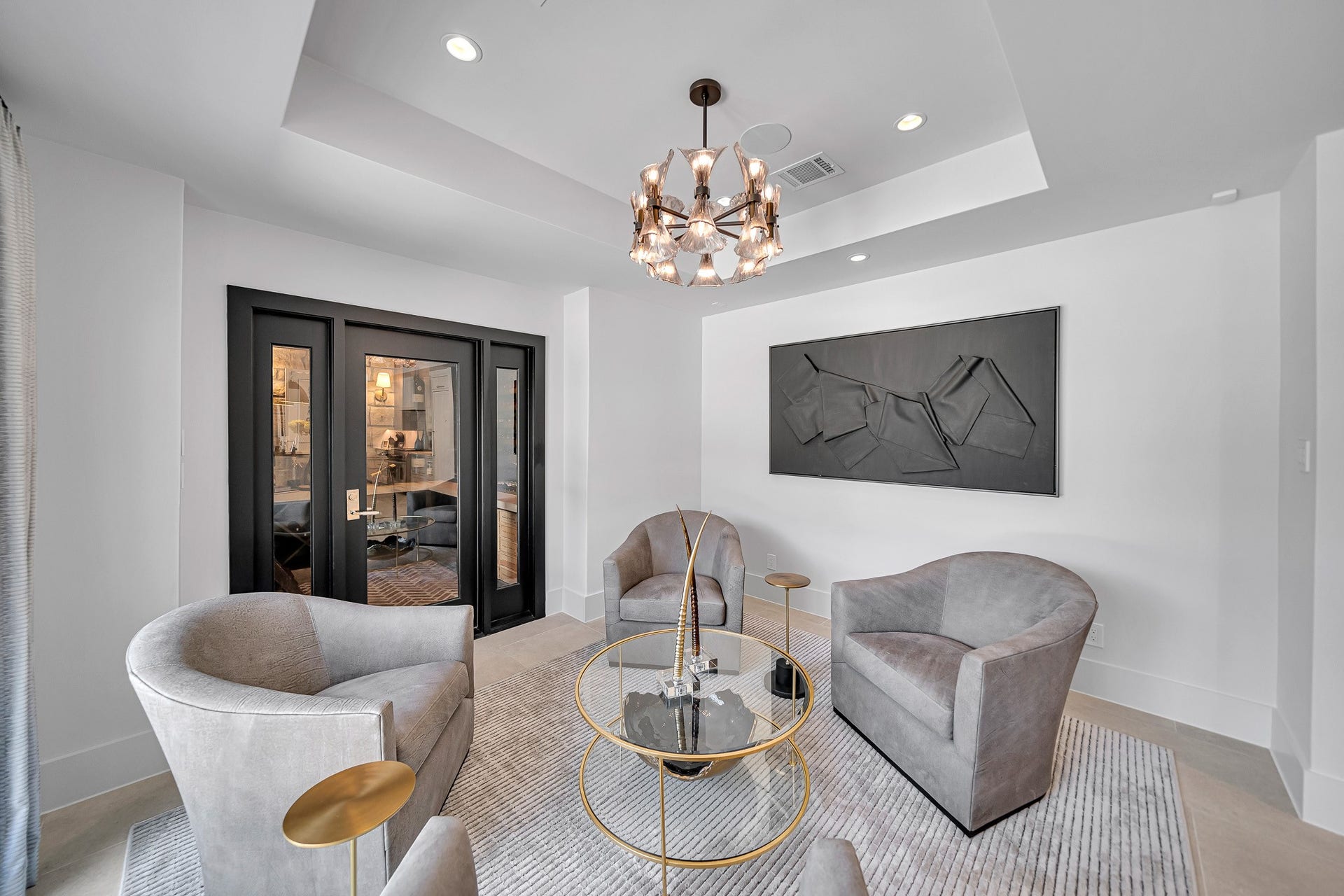 Architecturally detailed layered ceiling.