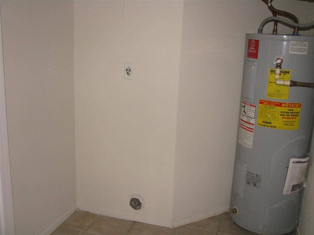 13303 Bassford Drive, Houston, TX 77083 utility room in house