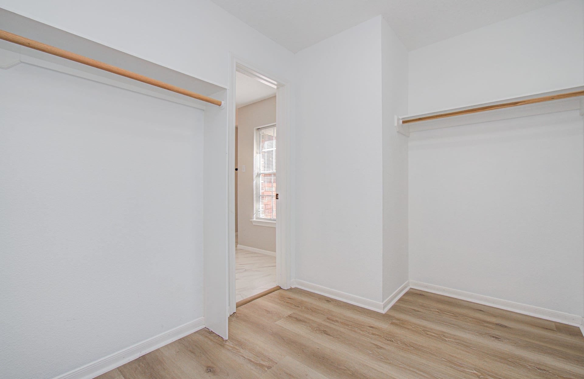 2934 Plantation Wood Lane, Missouri City, TX 77459 Spacious walk-in primary closet with LVP floors